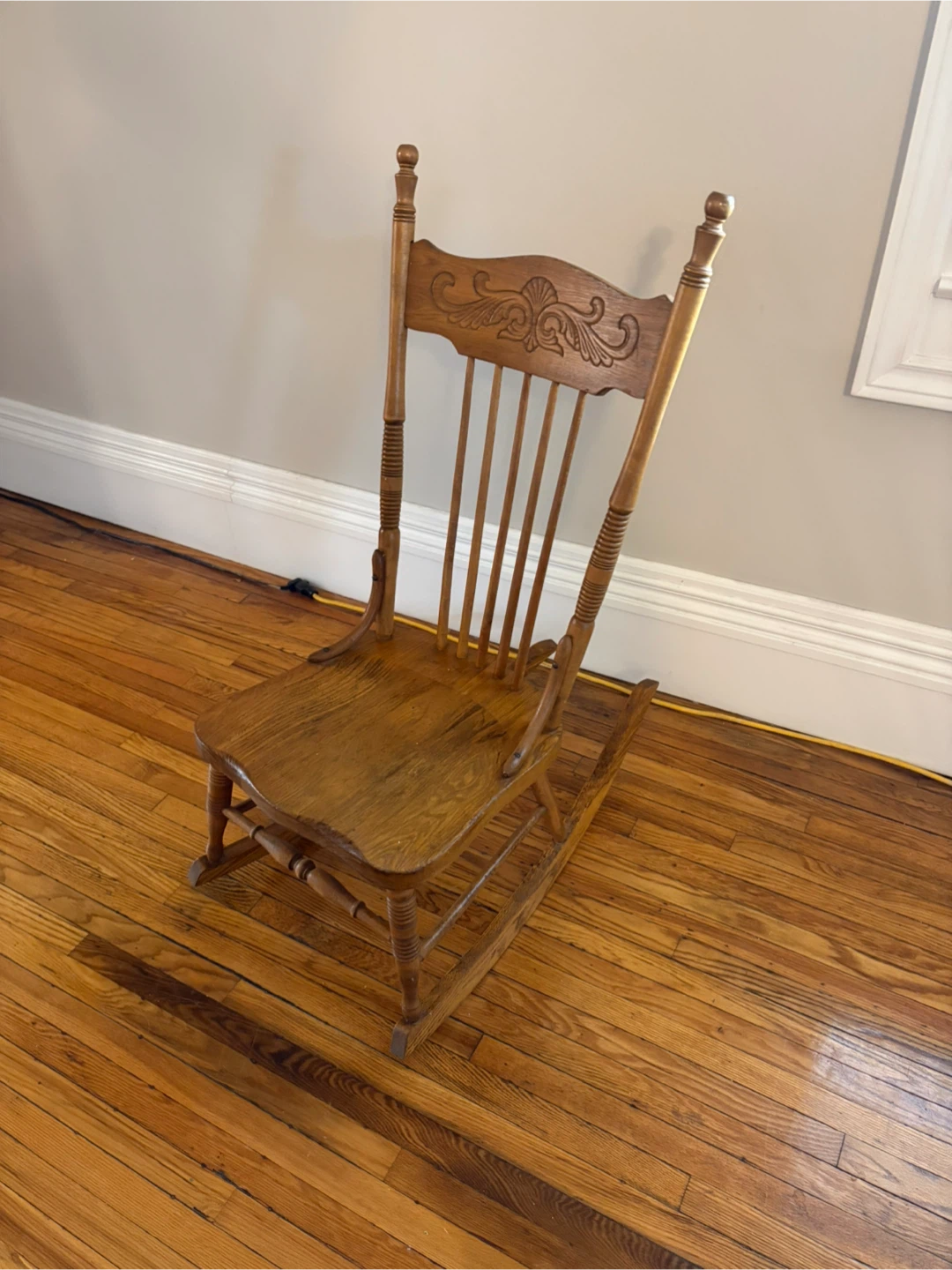 Wooden Rocking Chair with Ornate Back