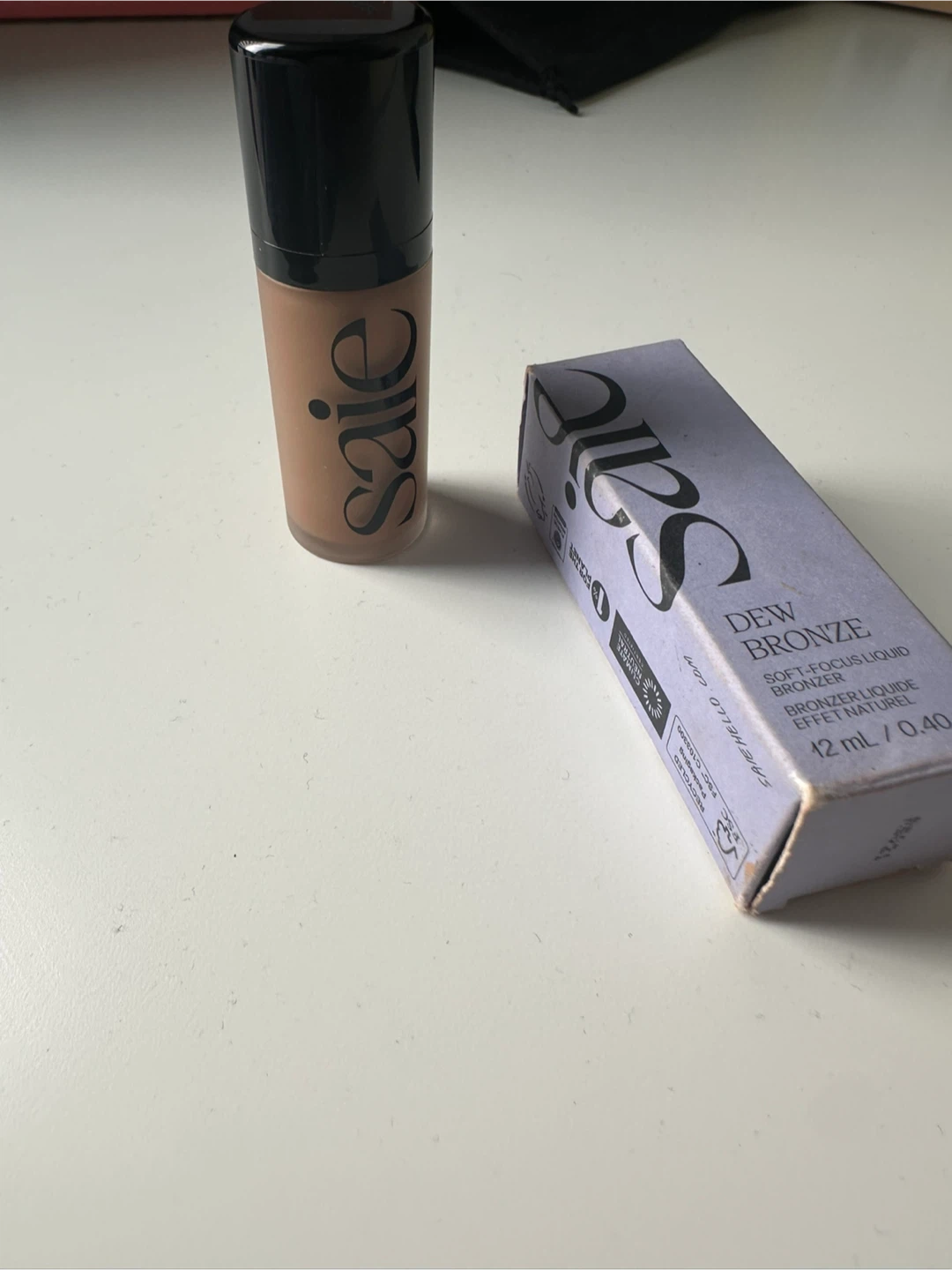 Saie Dew Bronze Liquid Bronzer in Sand