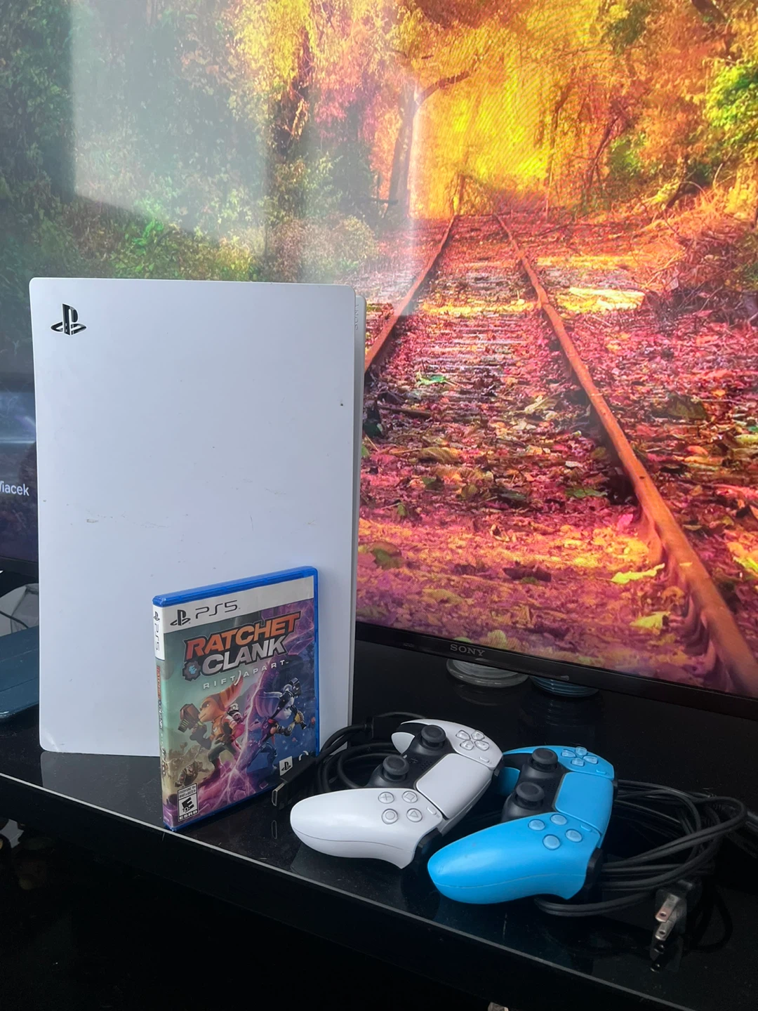 PlayStation 5 1TB disk drive and 2 Controllers