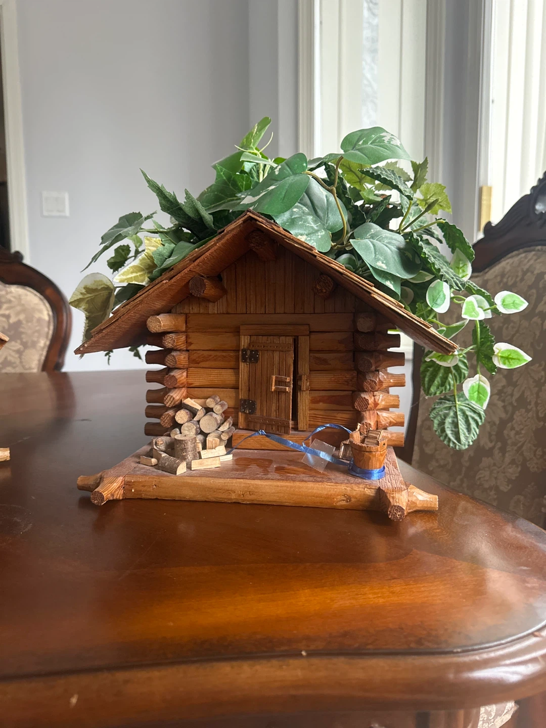 Wooden Log Cabin Decor with Faux Plants