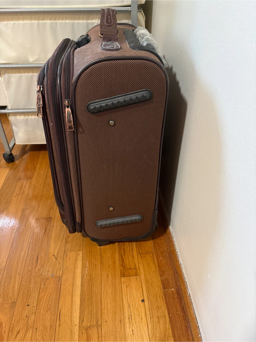 Brown Rolling Suitcase with Checkered Pattern