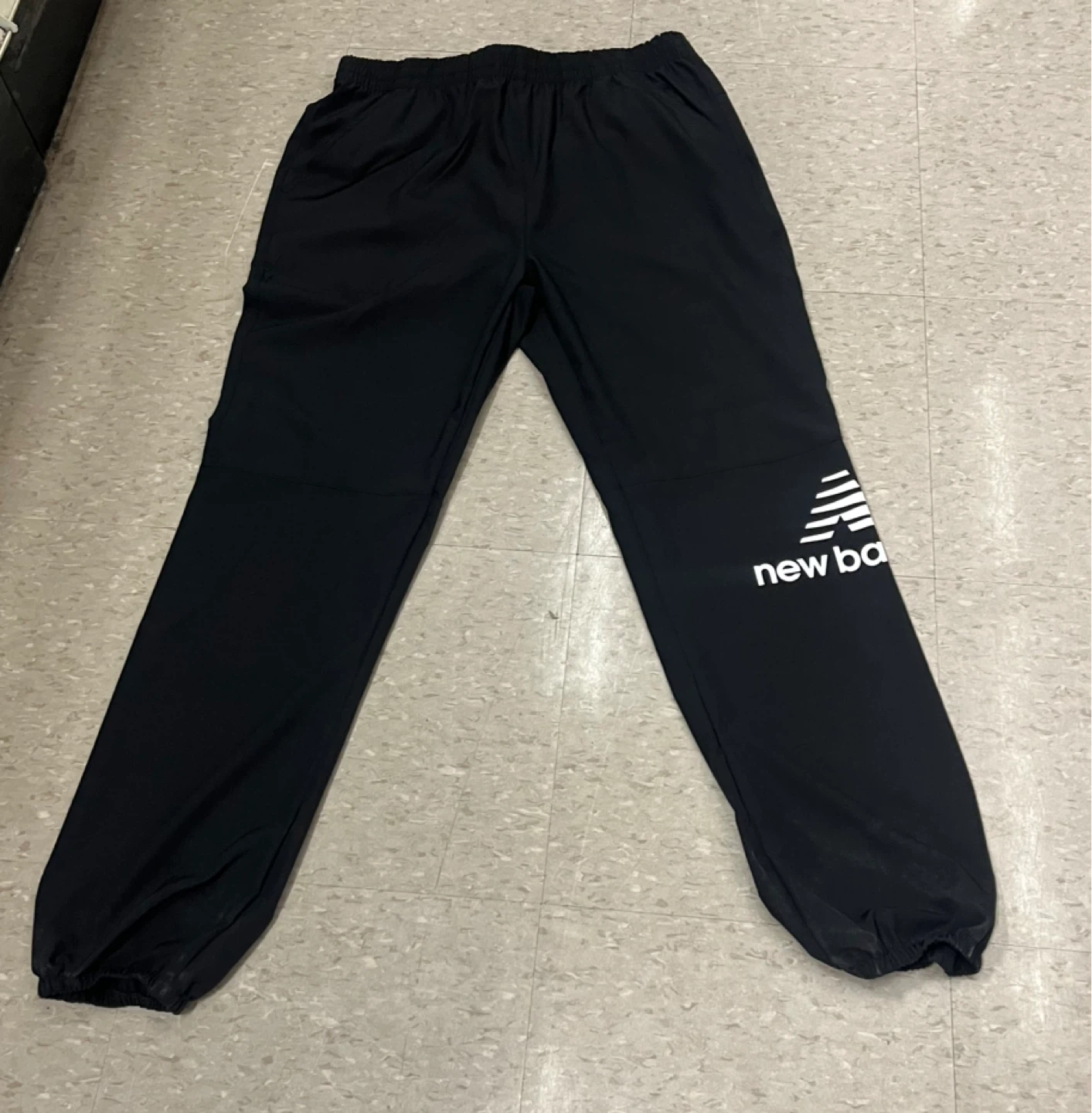New Balance Black reflective track pants
