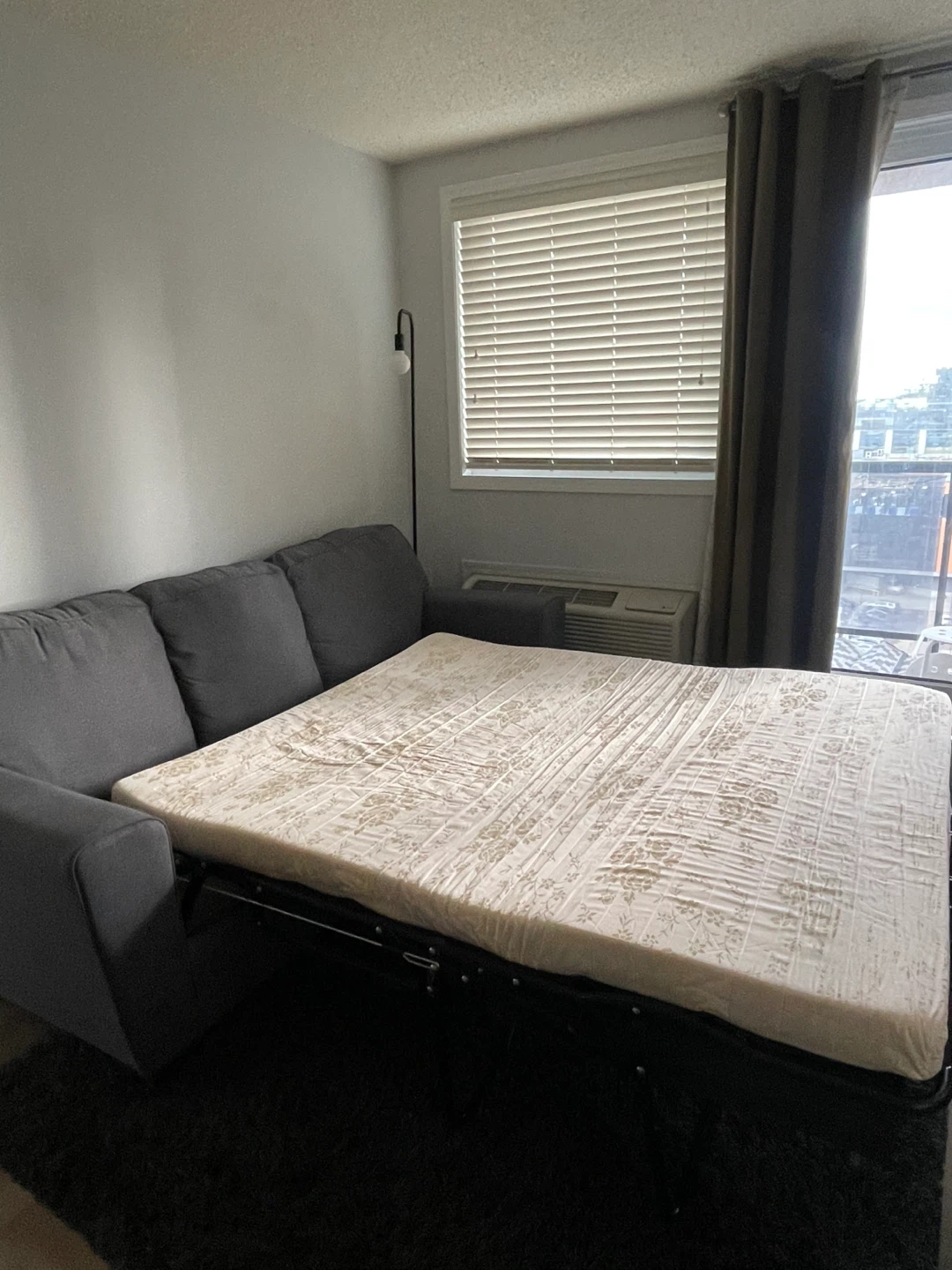 Grey three-seater sofa bed - photo 3