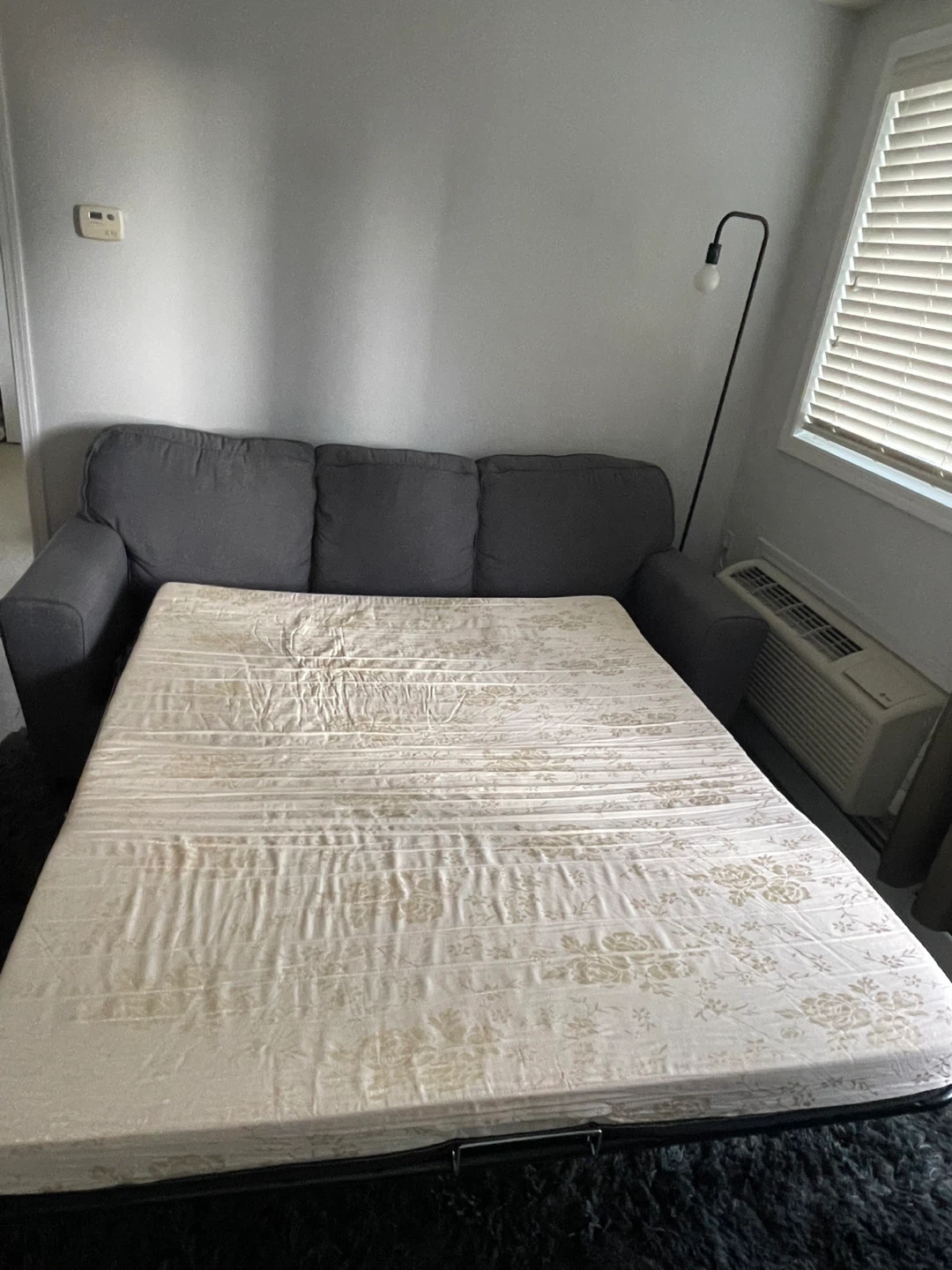 Grey three-seater sofa bed - photo 4