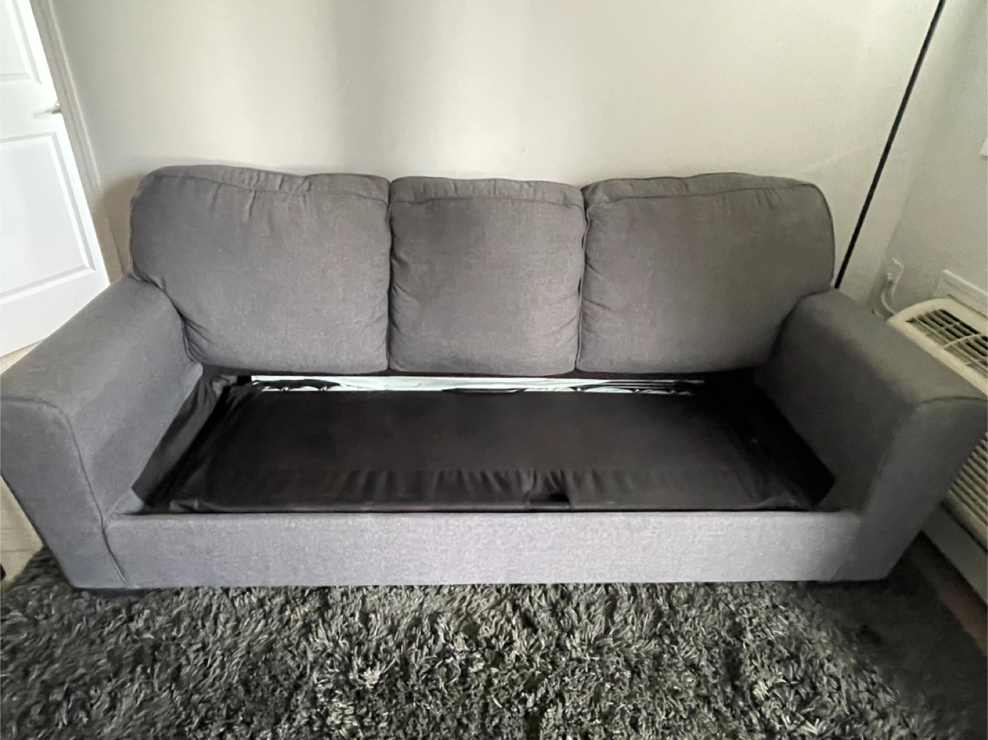 Grey three-seater sofa bed - photo 2