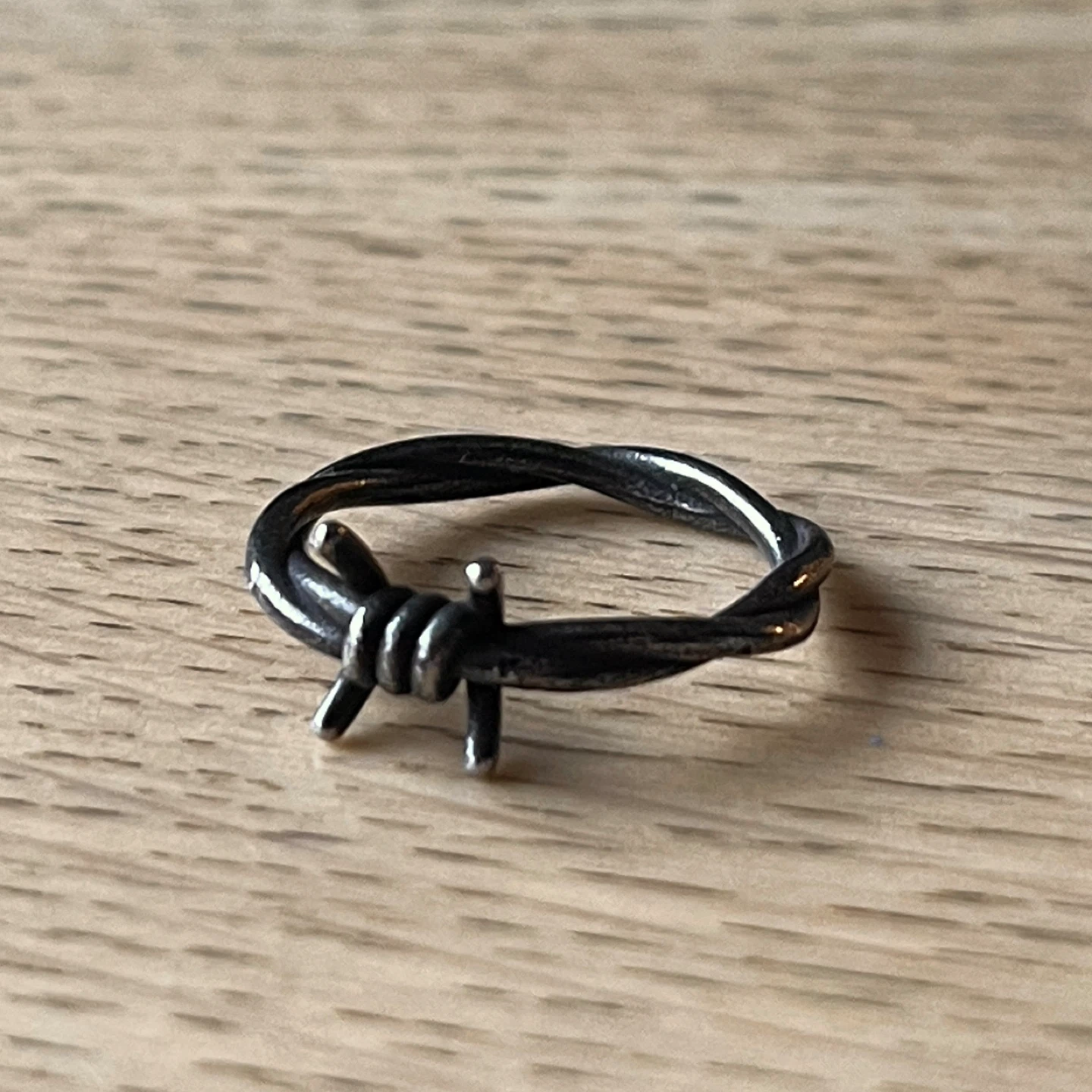 Oxidized twisted “barbed wire” stainless steel ring (size 7)