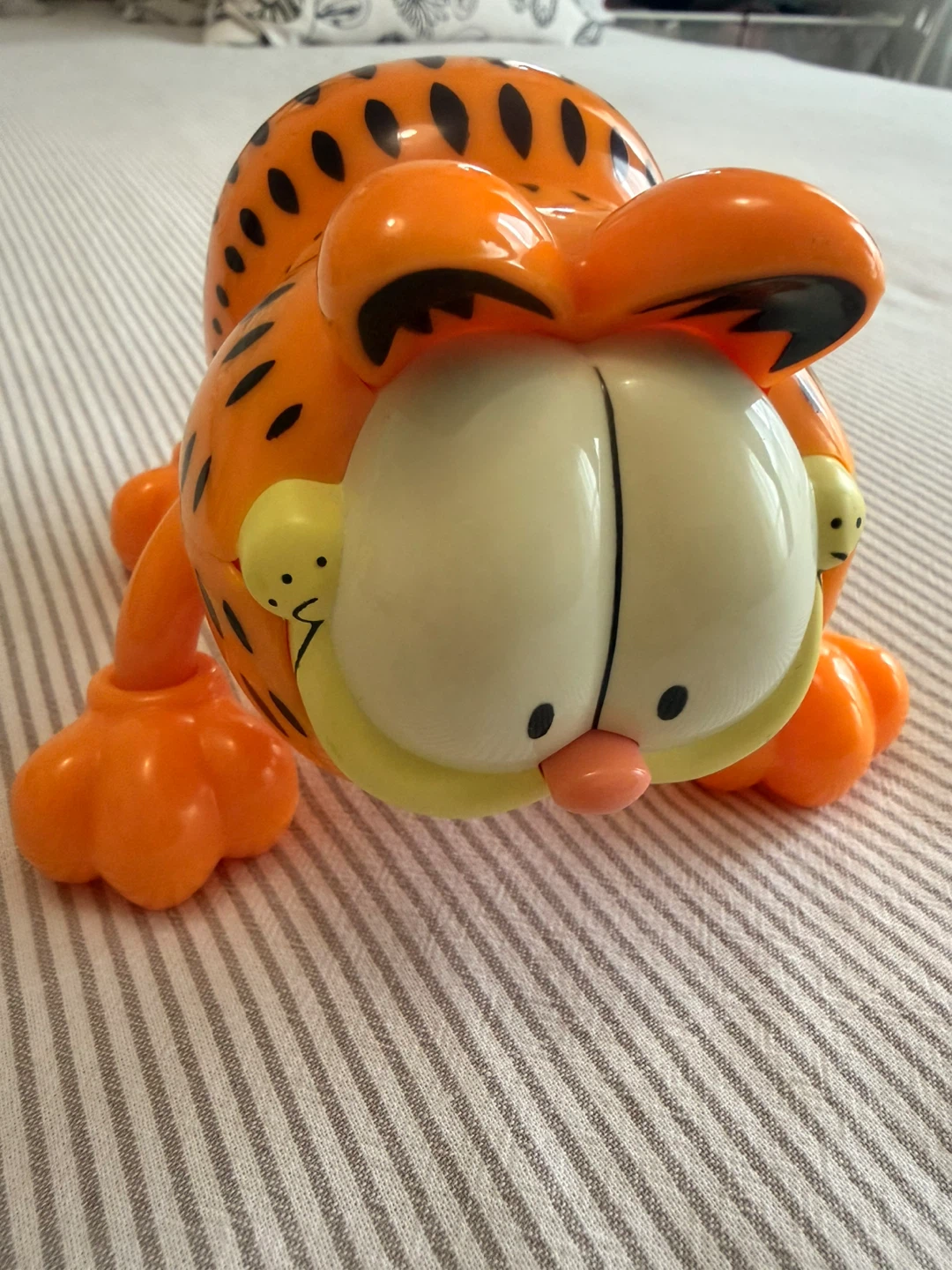 Garfield-shaped handheld massager.