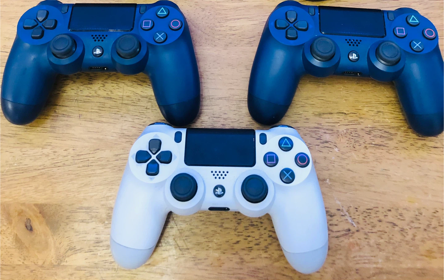 Sony PlayStation DualShock 4 Controllers (2 Blue, 1 White)