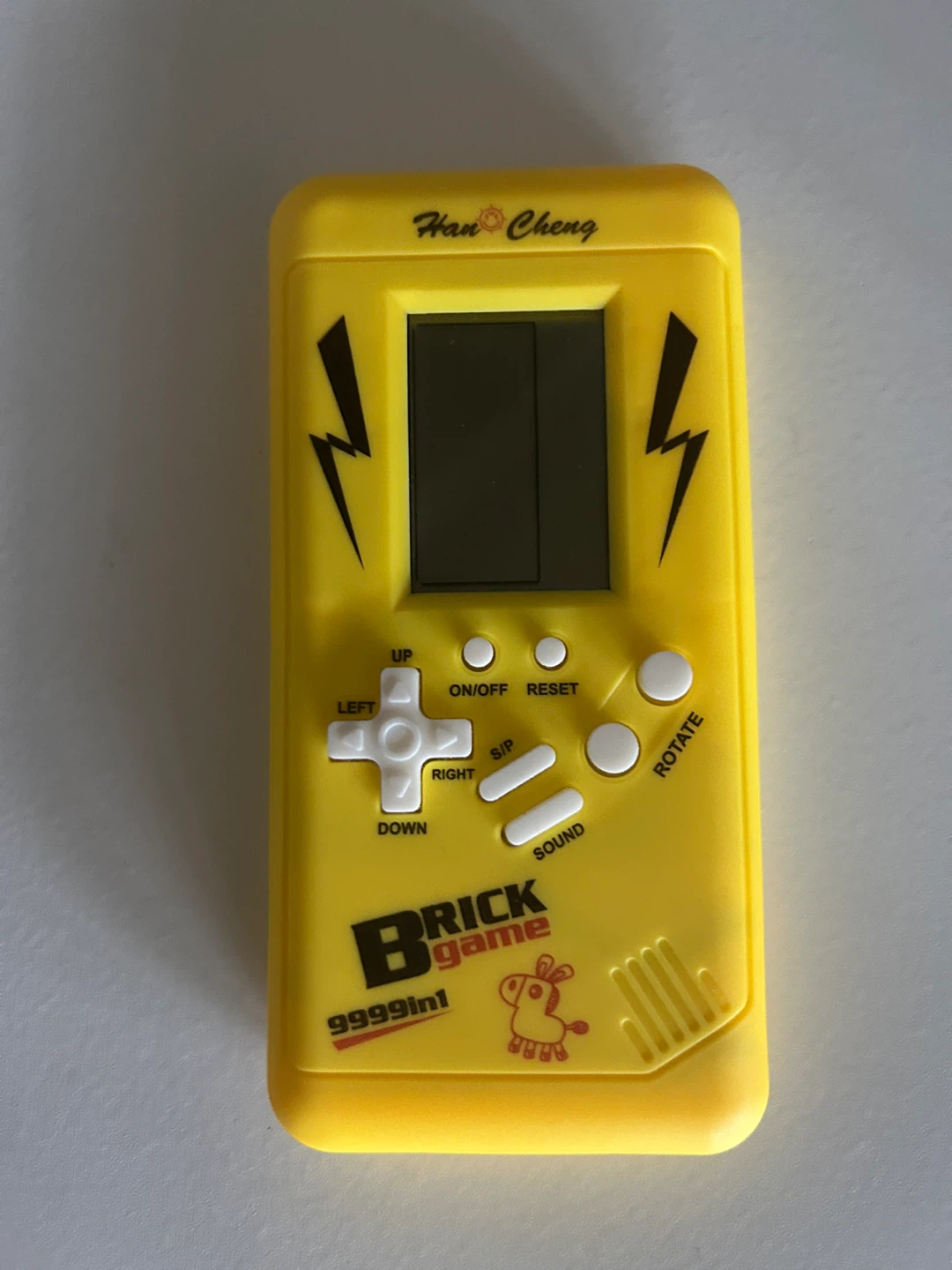Han Cheng 9999 in 1 Brick Game - Yellow