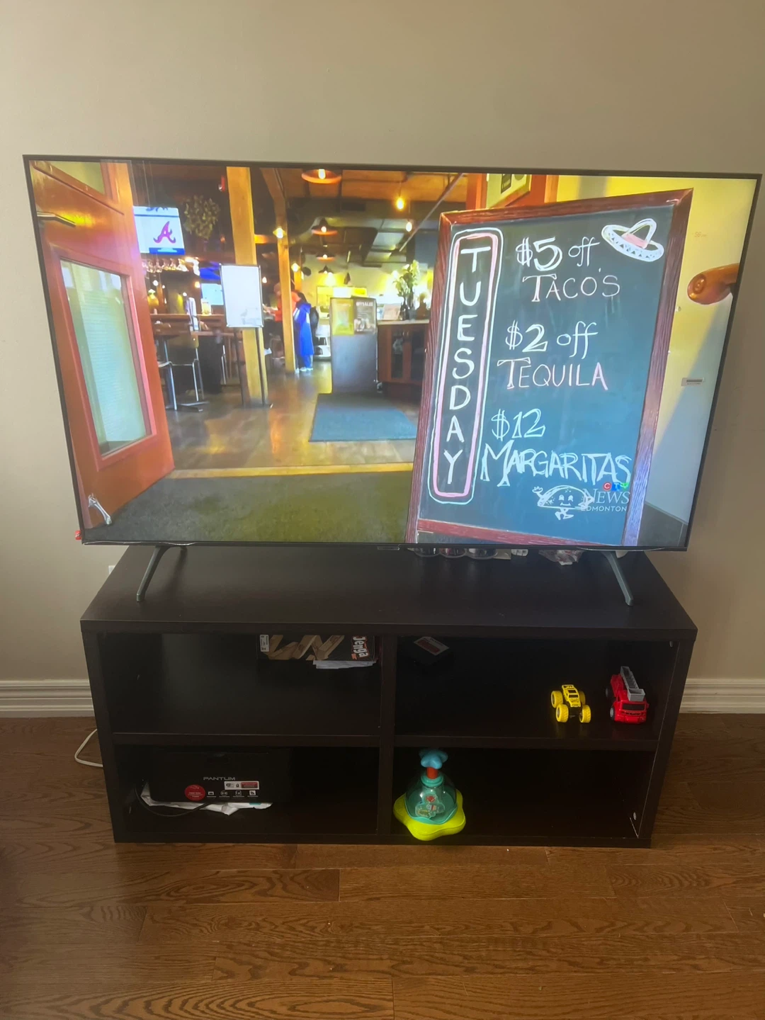 Samsung Crystal 58-inch Smart TV with TV table