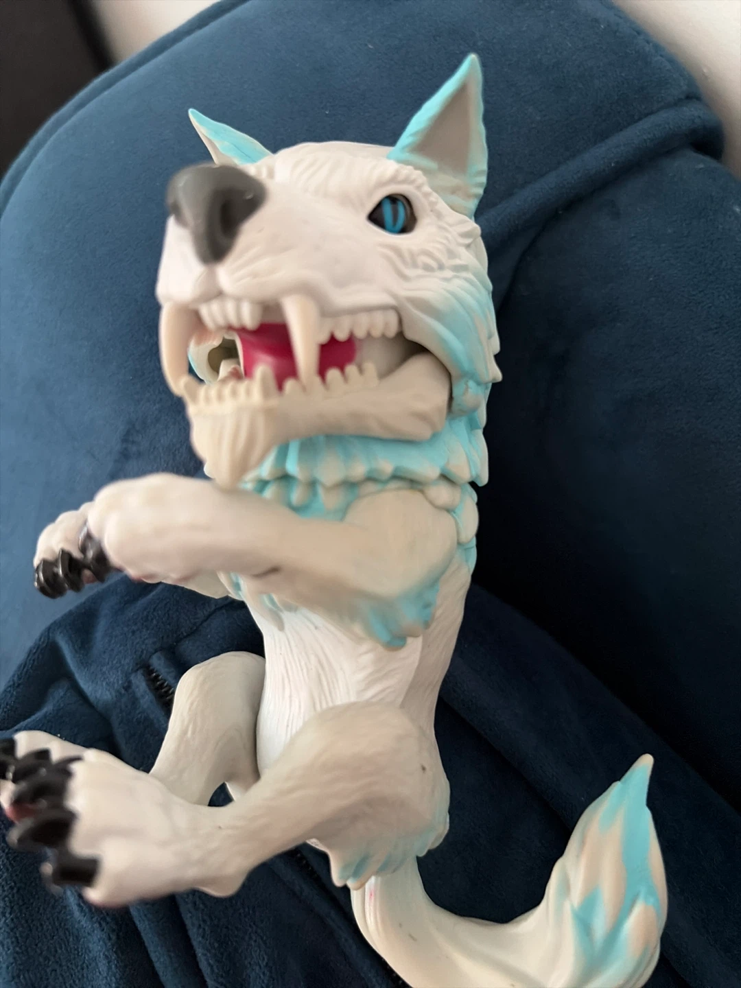 White and Blue Wolf Action Figure Toy