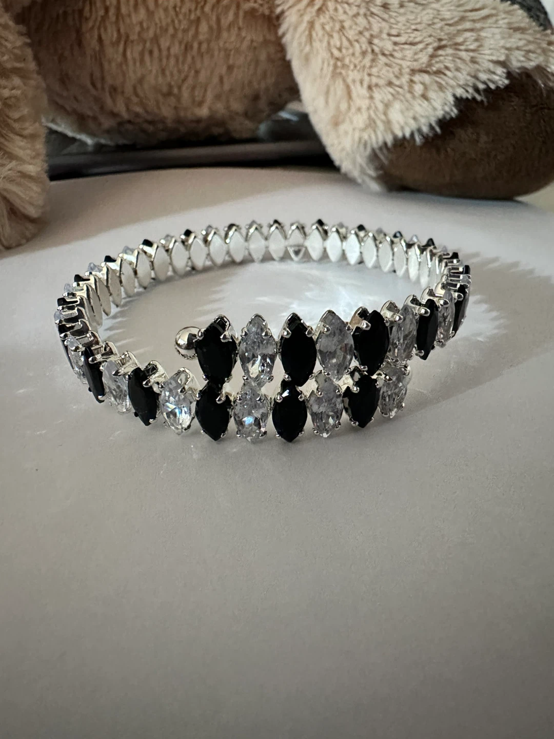 Silver Tone Bangle Bracelet with Black and Clear Stones