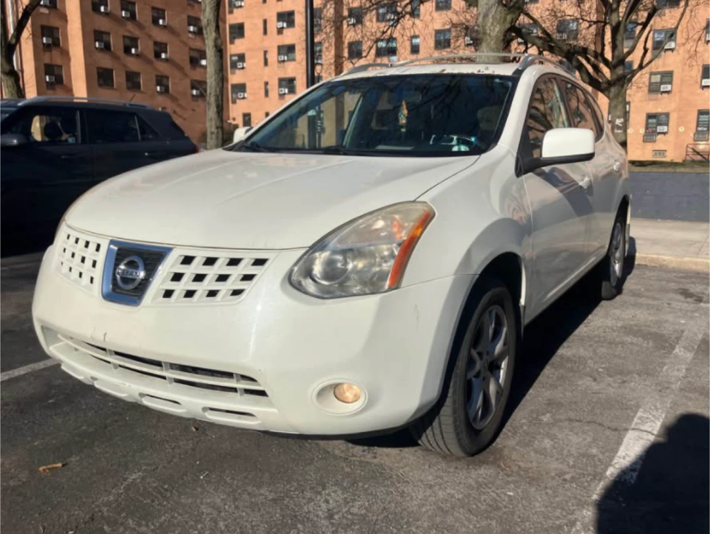White Nissan Rogue SUV