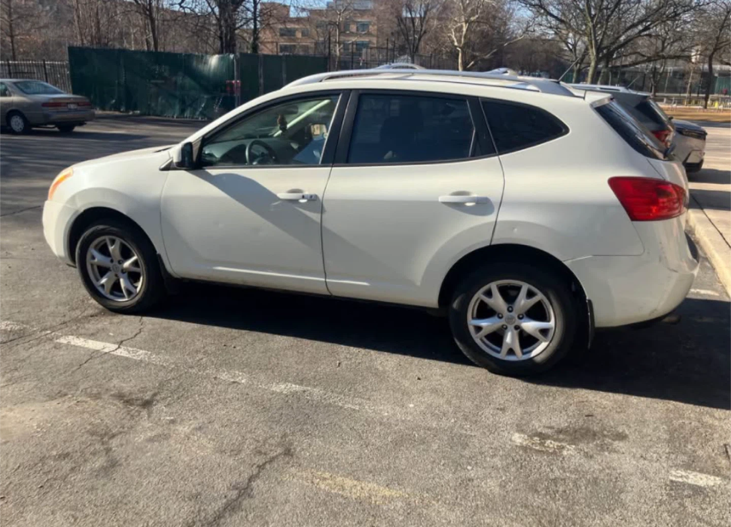 White Nissan Rogue SUV - photo 5