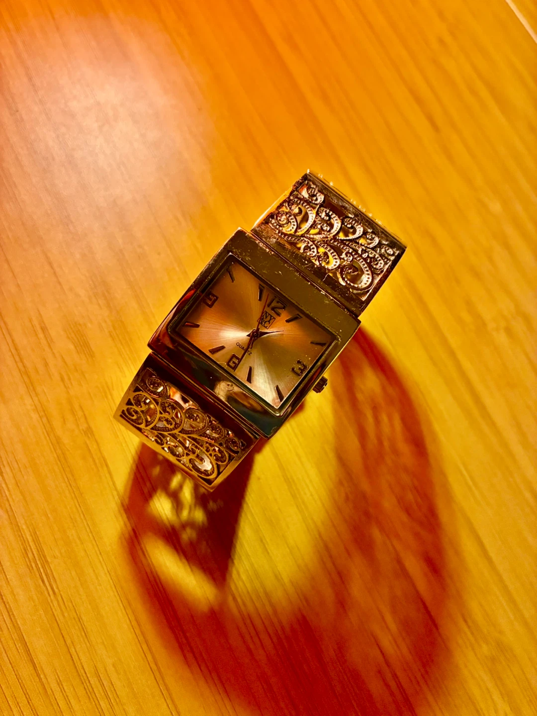 Ornate Gold Tone Bangle Watch