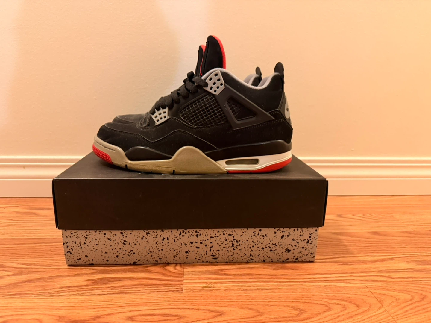 Air Jordan 4 "Bred" Black Red Sneakers