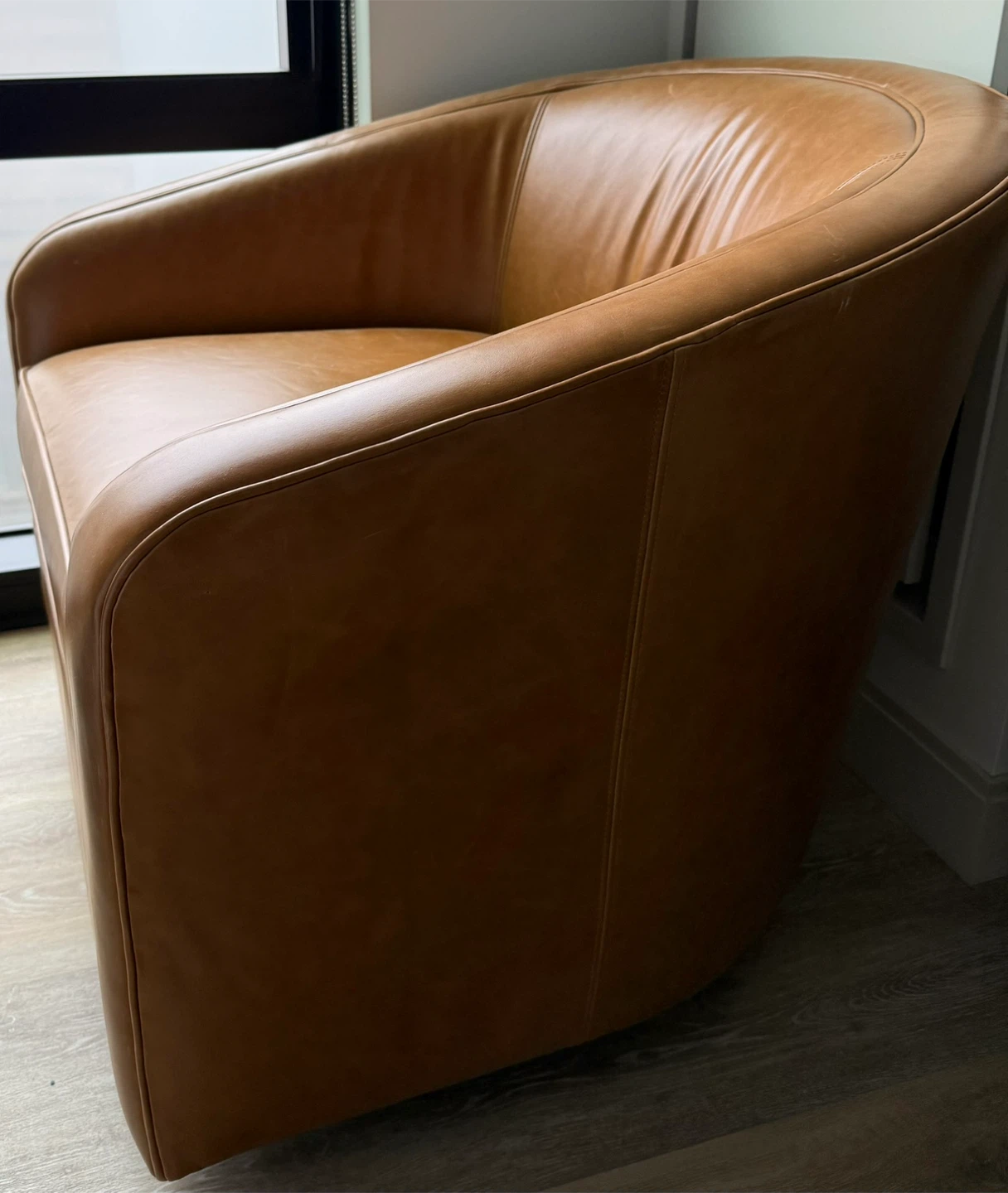 Brown Leather Swivel Armchairs
