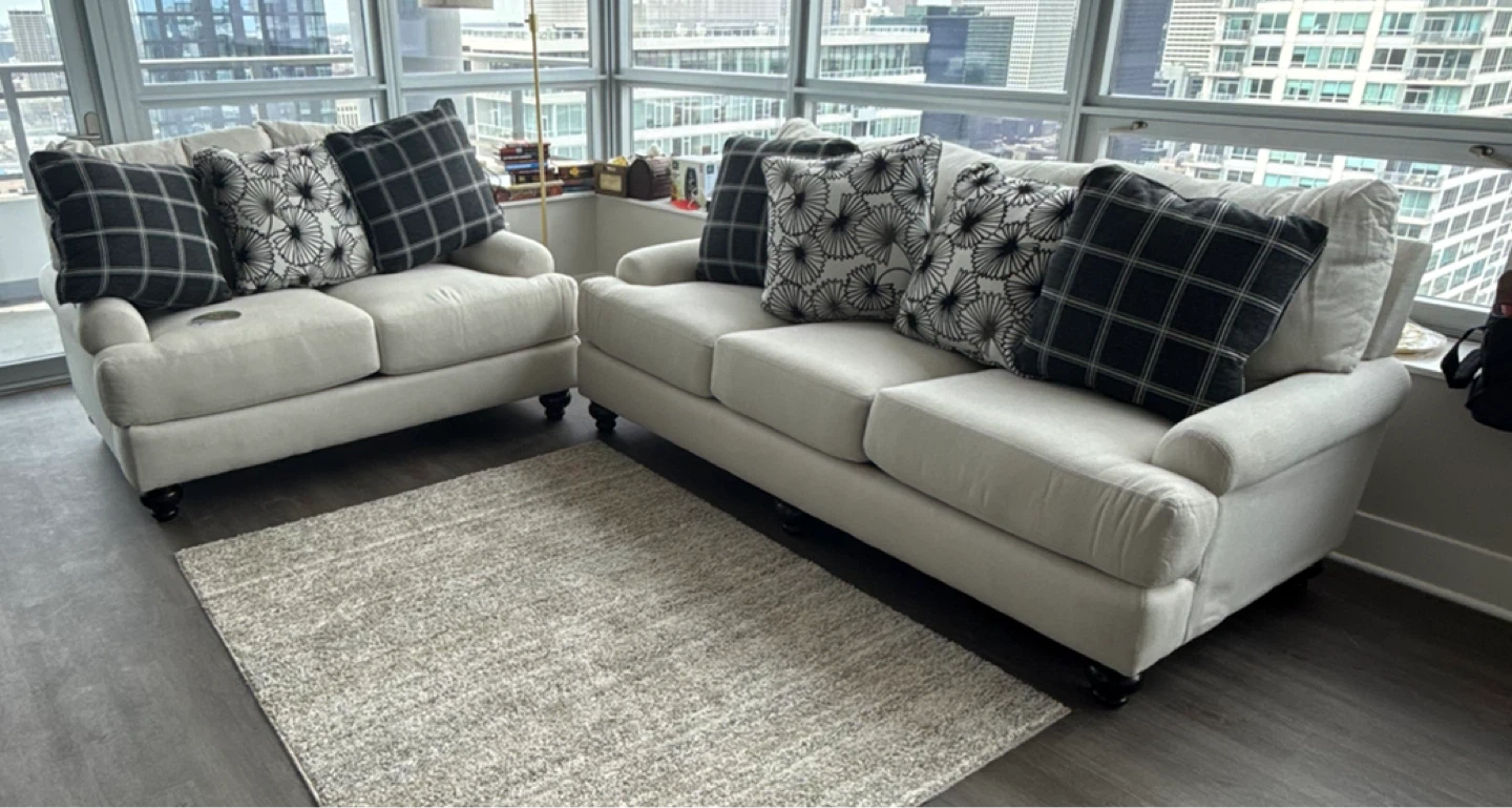 Cream Sofa and Loveseat with Decorative Pillows