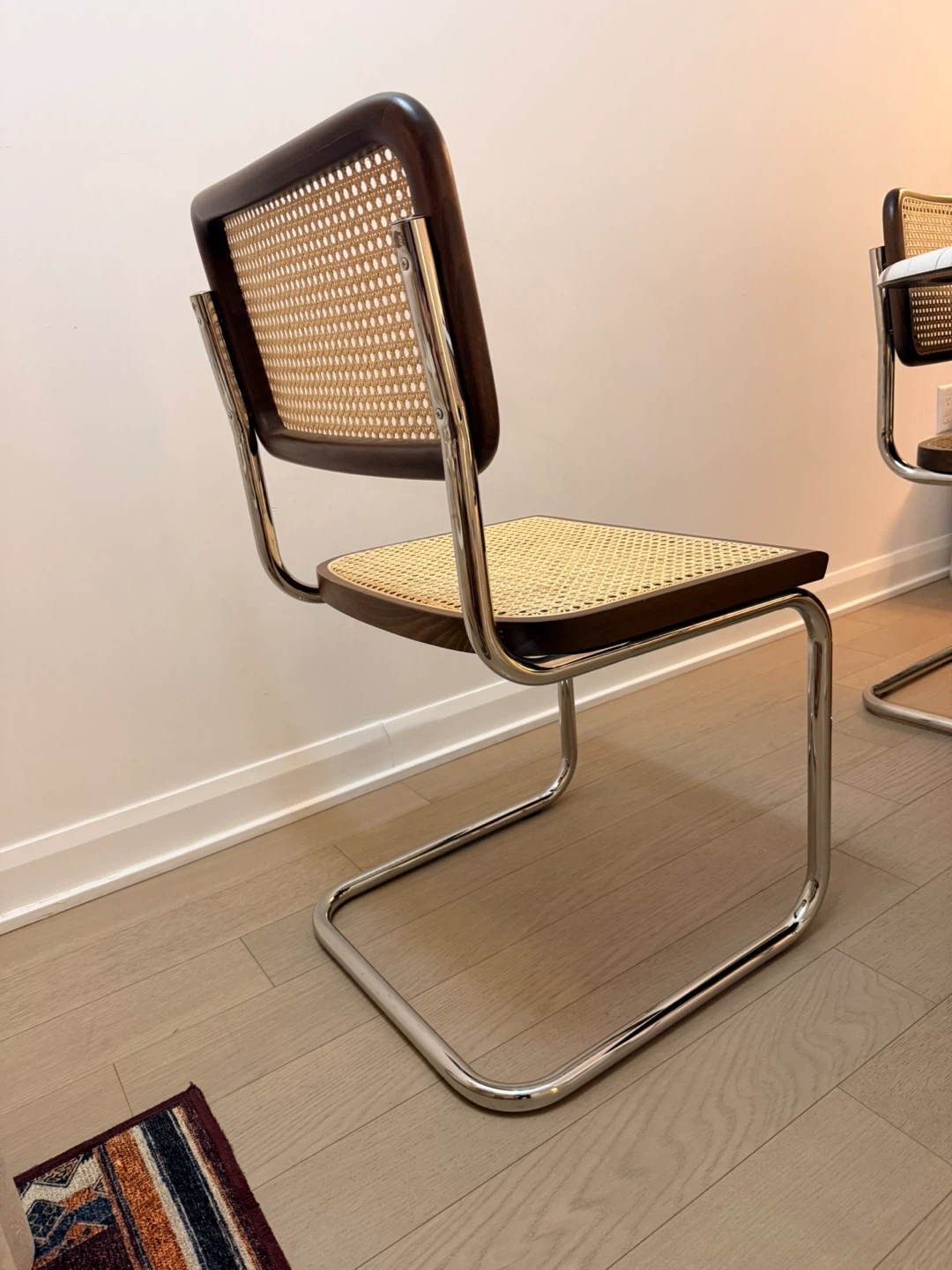 2 marcel breuer brown chairs