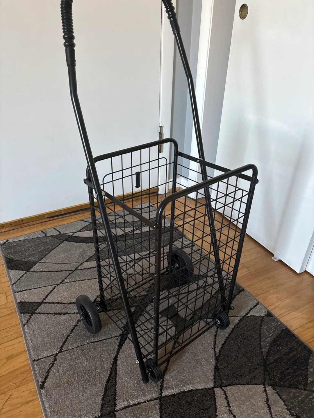 Black Metal Rolling Shopping Cart