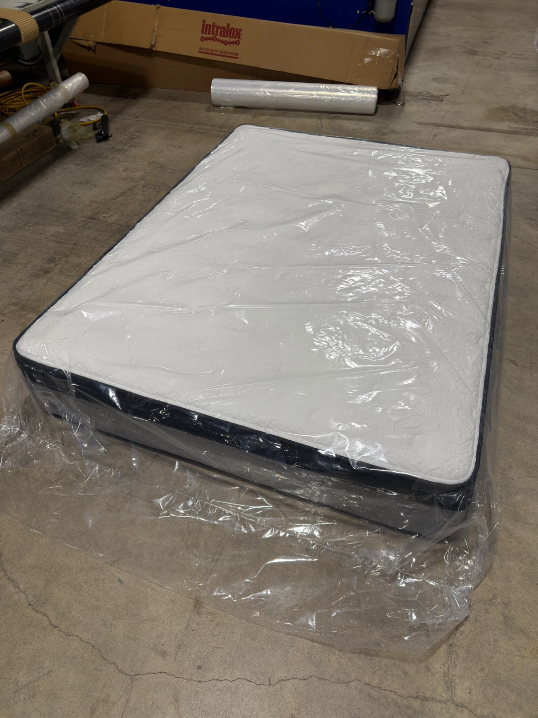 New Mattress in Plastic Wrap