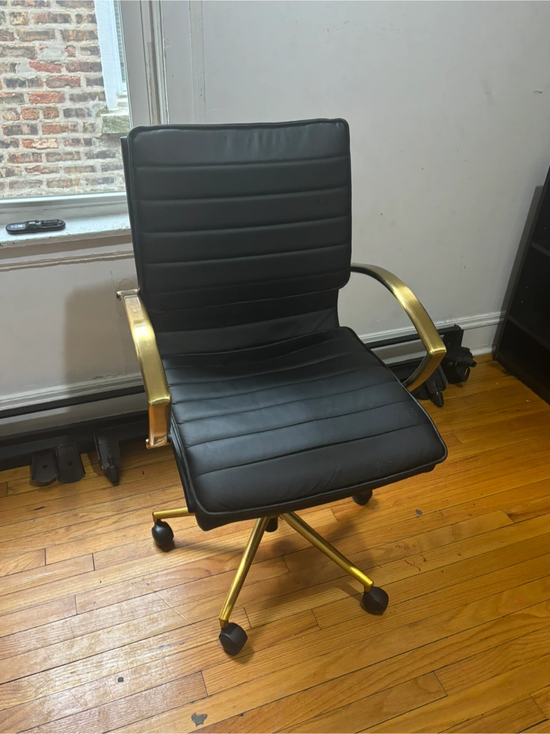 Black Faux Leather Office Chair with Gold Accents
