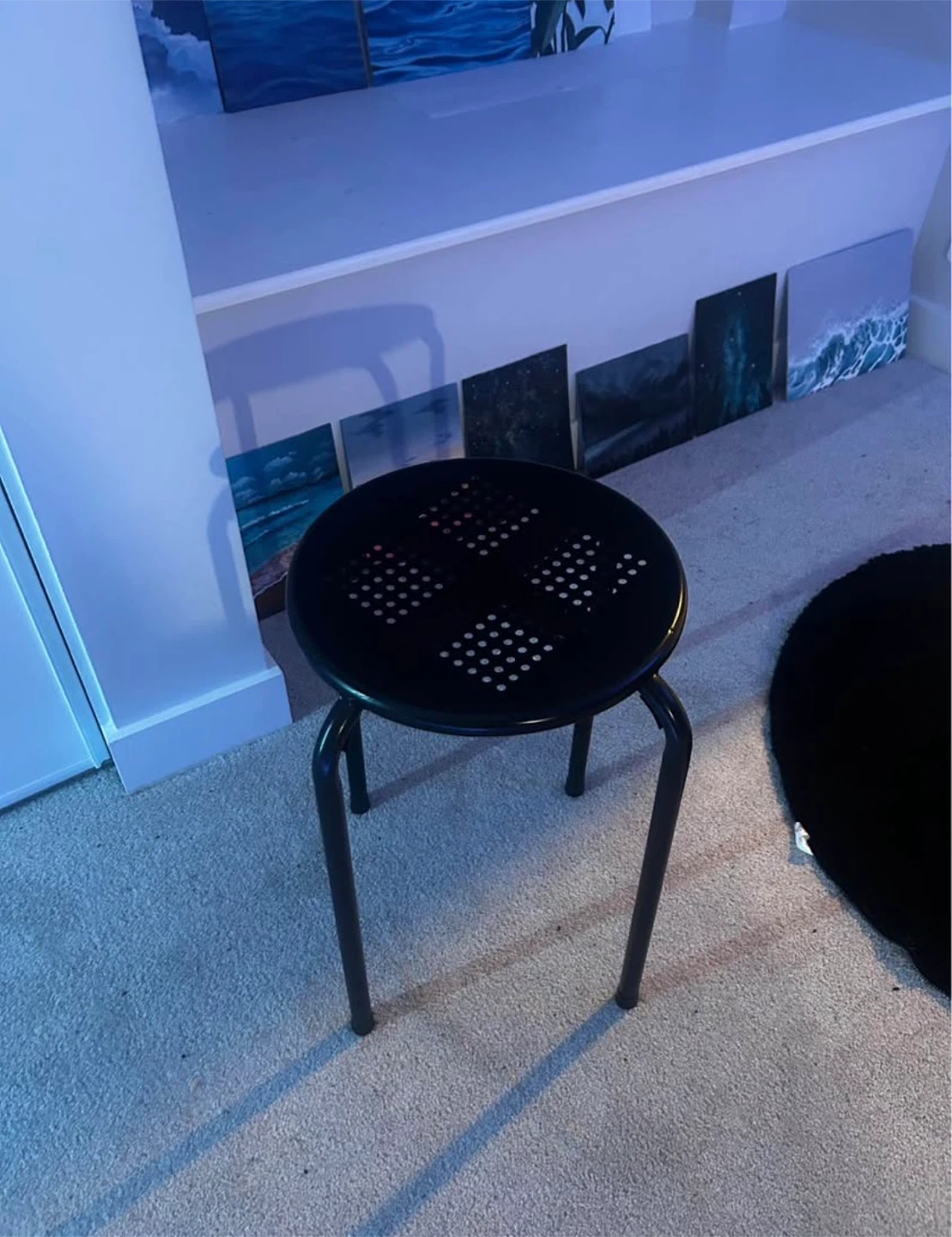 Black metal stool