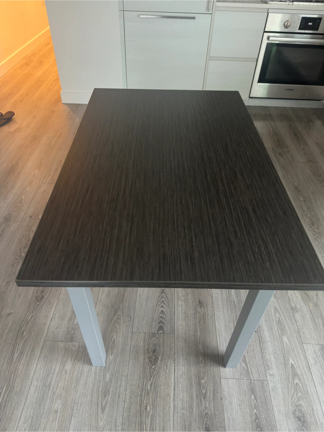 Dark Wood Dining Table with Silver Legs