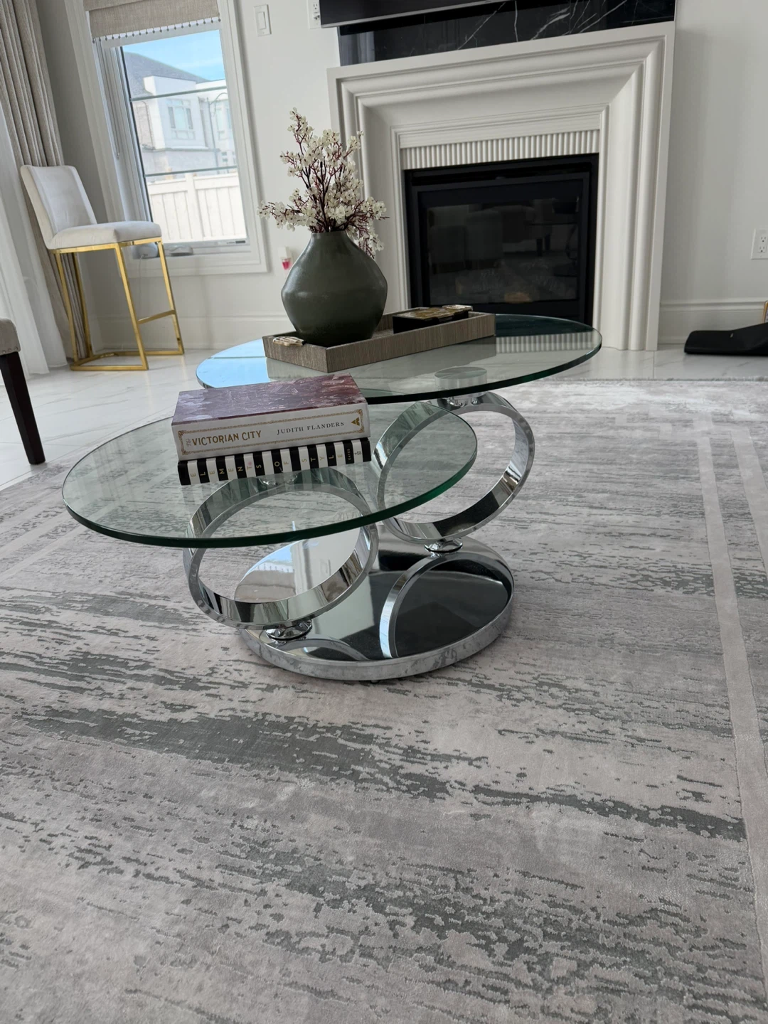 Glass and Chrome Oval Coffee Table $210