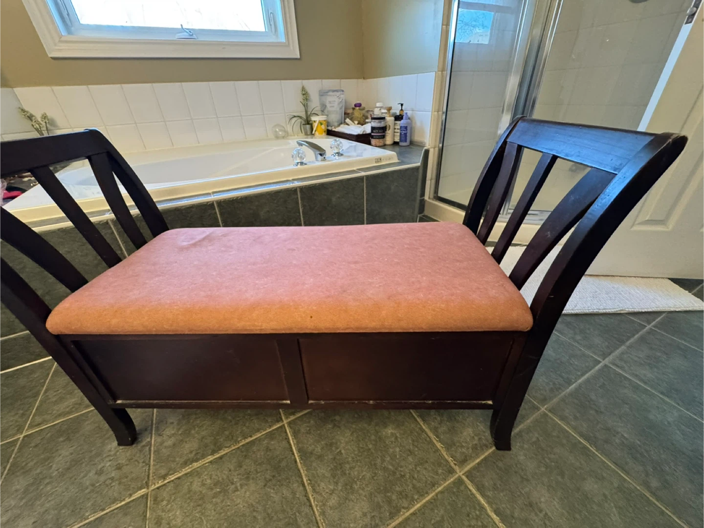 Wooden storage bench with upholstered seat