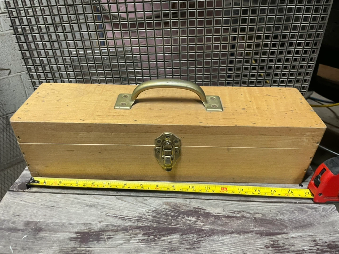 vintage wooden storage box, possibly used as a toolbox