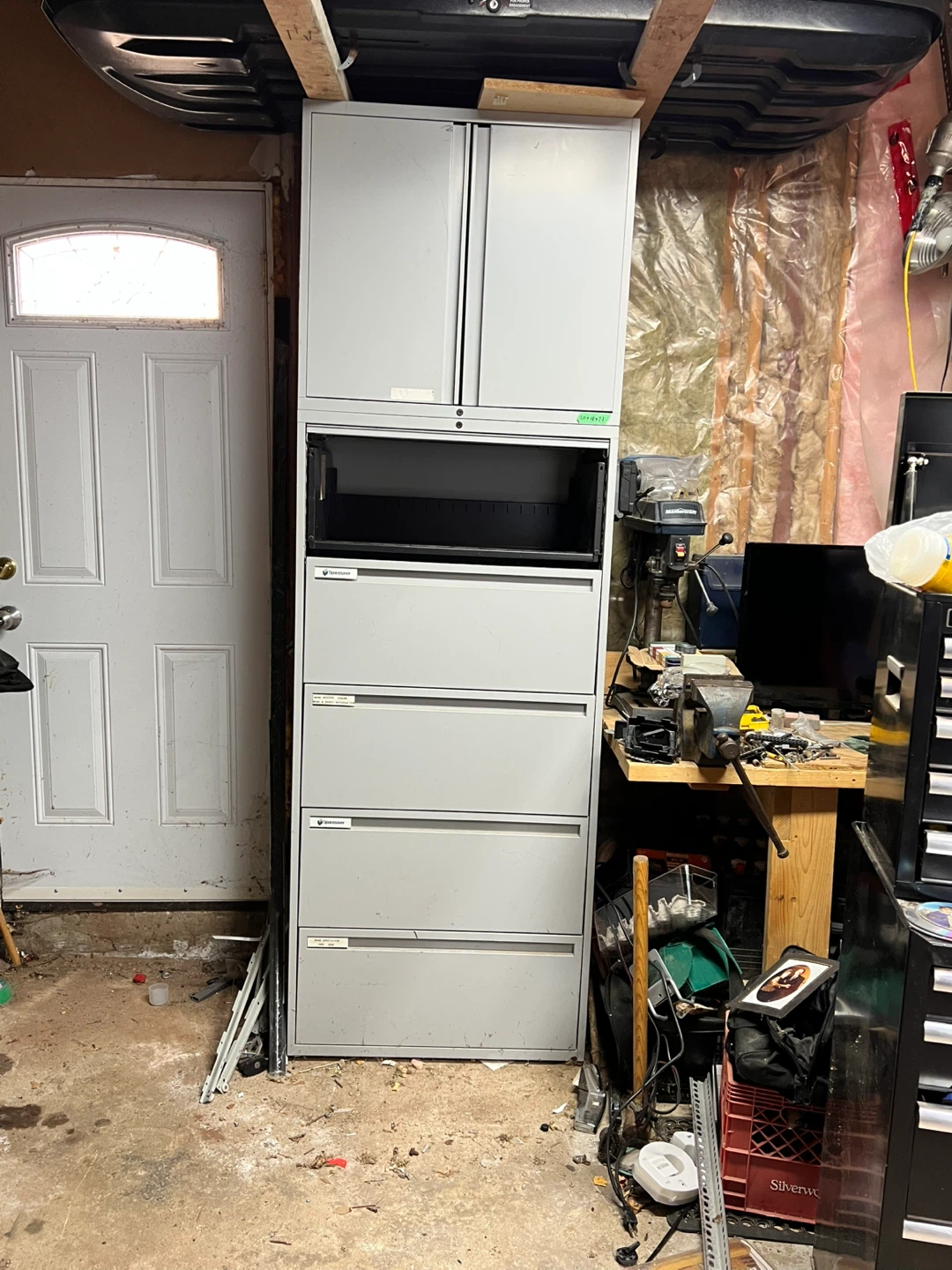 Metal filing cabinet.