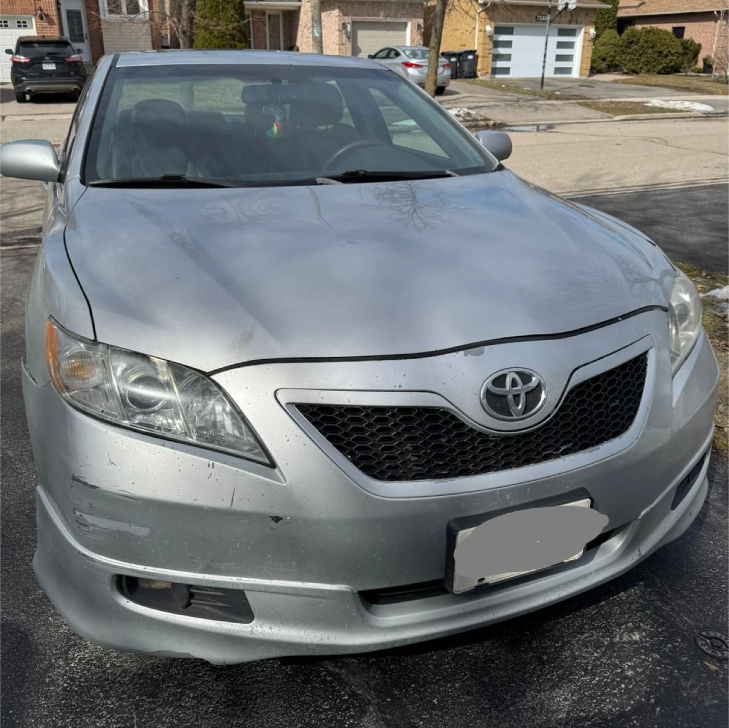 Silver Toyota Camry SE Sedan - very used and faithful