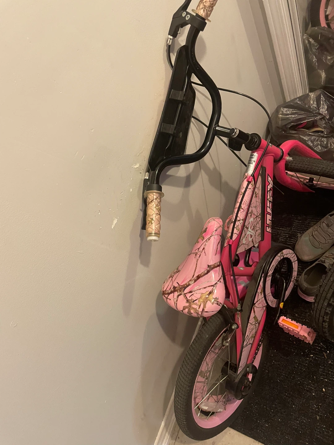 Pink Huffy Bicycle with Camo Seat