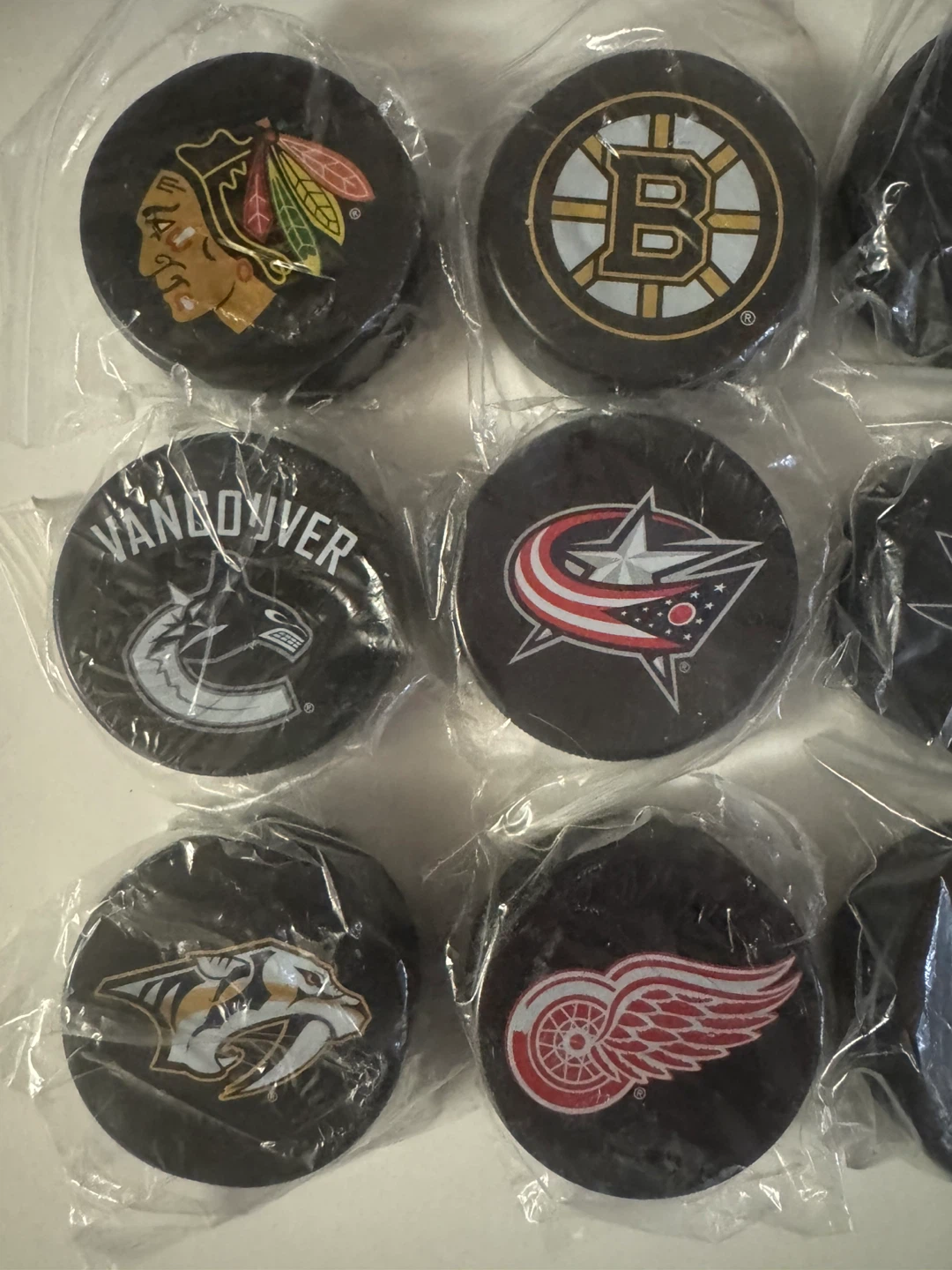 NHL Hockey Puck Twist-off Bottle Openers - photo 2