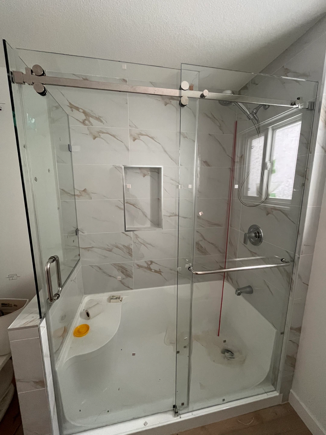 Custom Glass Shower Enclosure with Marble Tile Accents - photo 2