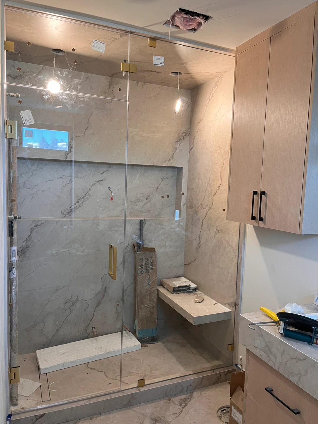 Custom Glass Shower Enclosure with Marble Tile Accents - photo 5