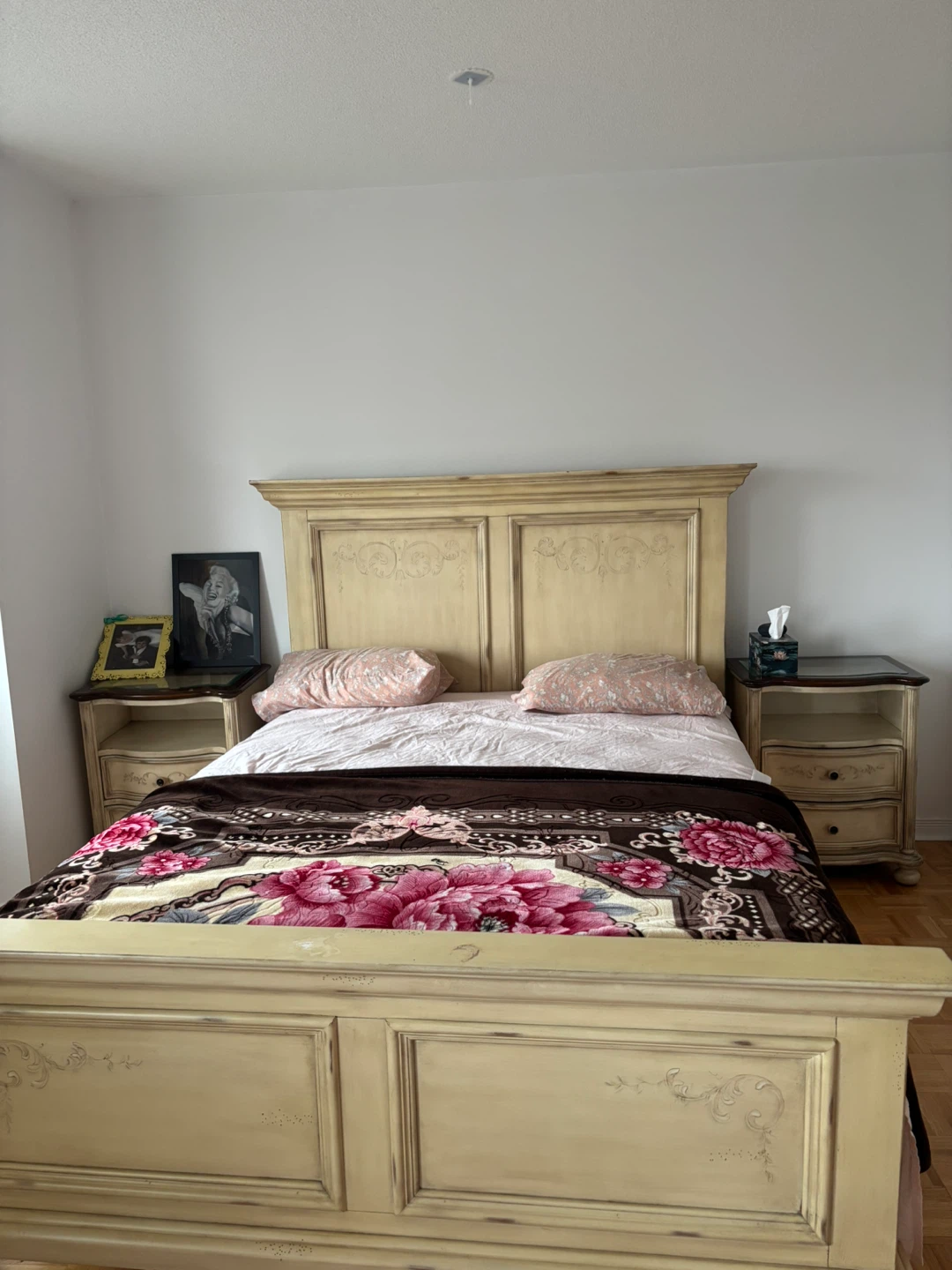 Cream coloured bedroom set with dresser and nightstands