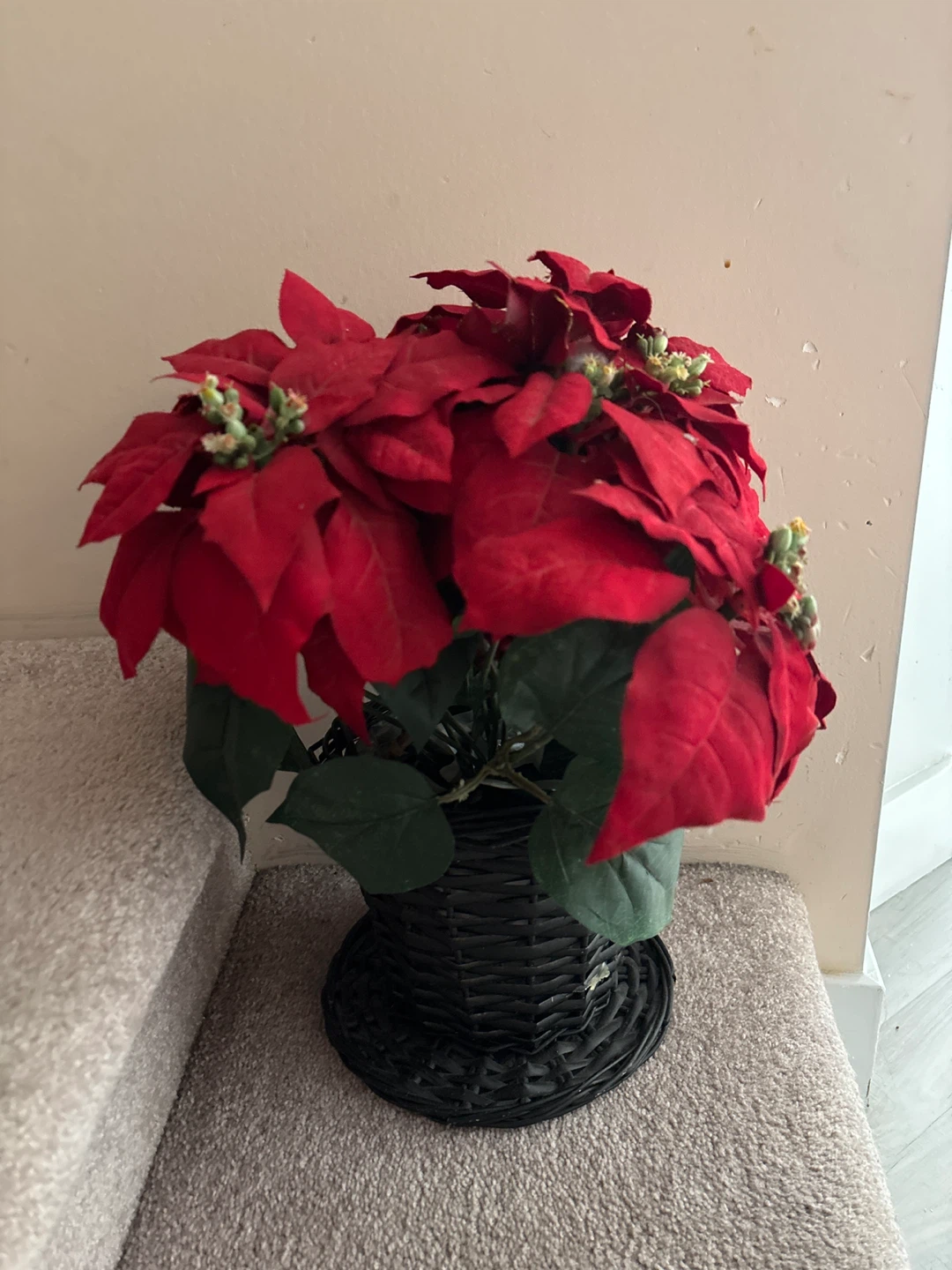 Artificial Poinsettia Plant in Black Wicker Basket