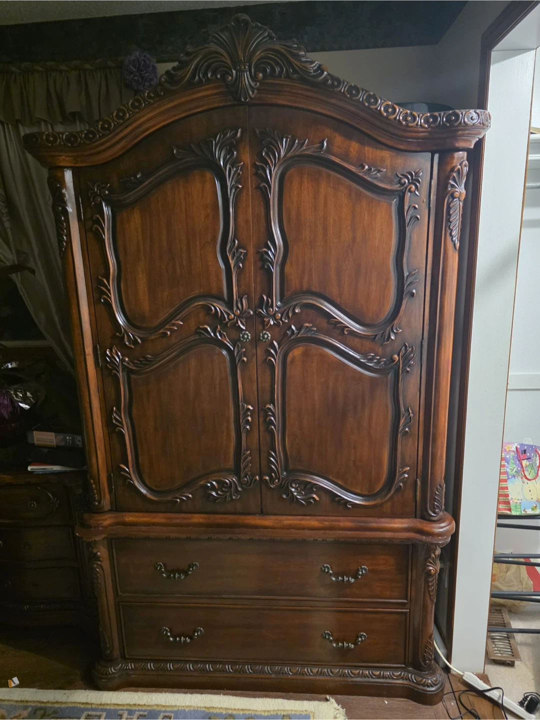 Ornate Dark Wood Armoire with Drawers