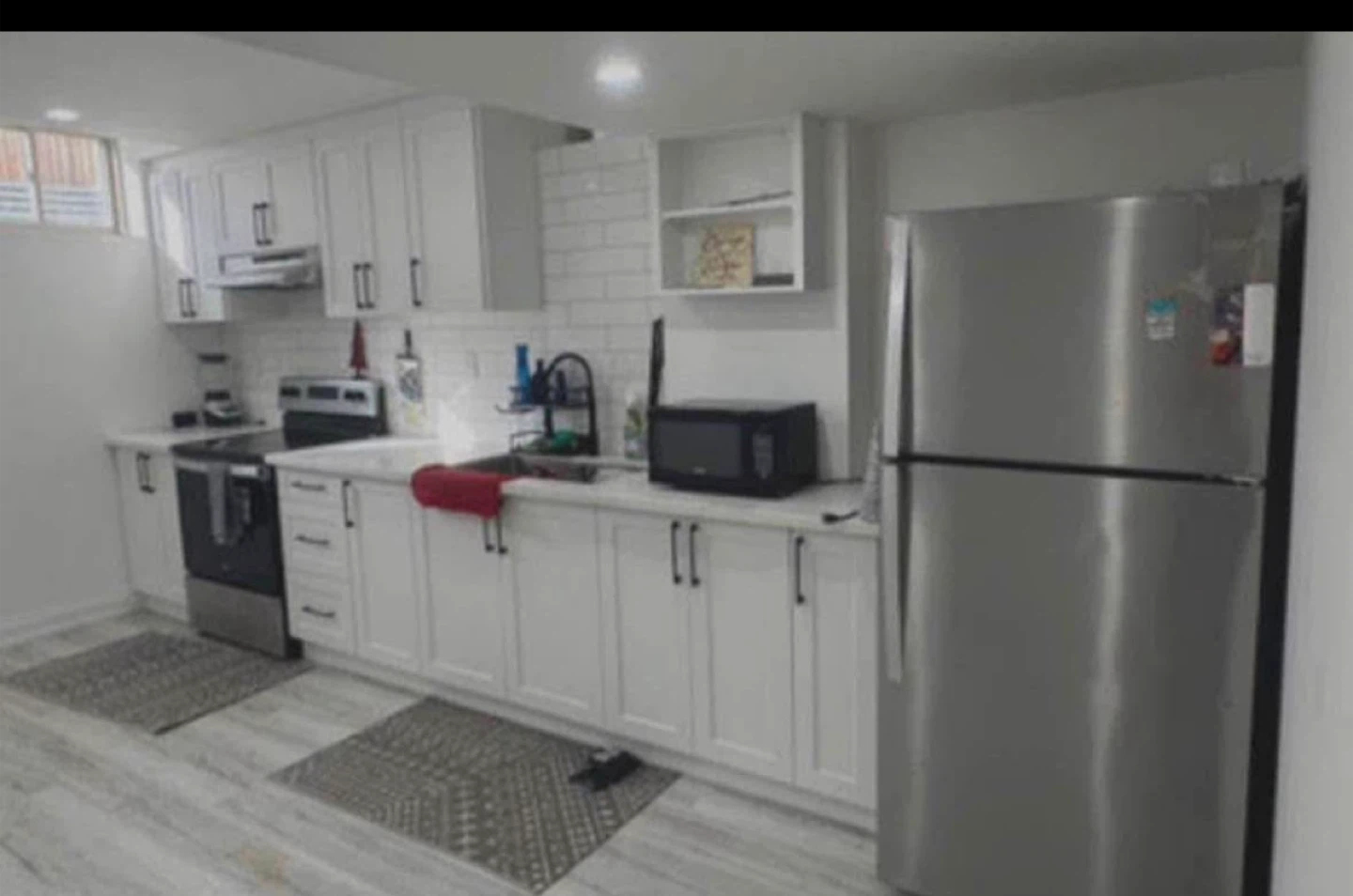 One bedroom in a shared basement apartment - photo 2