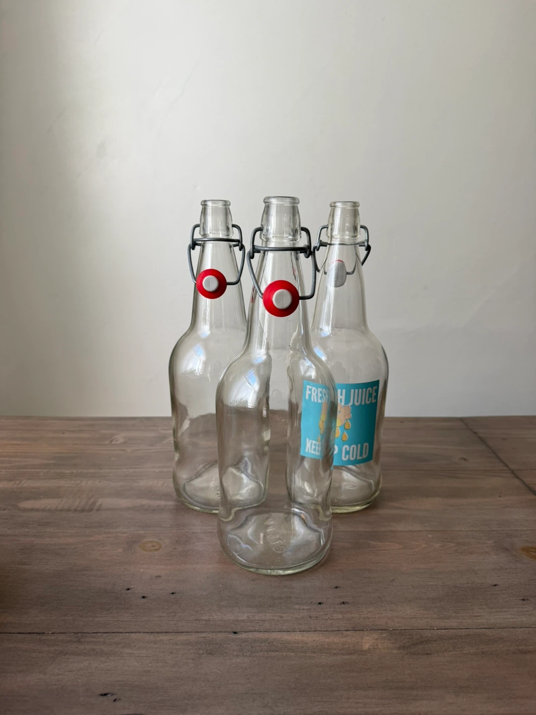 Set of x3 clear 1L pop-top bottles