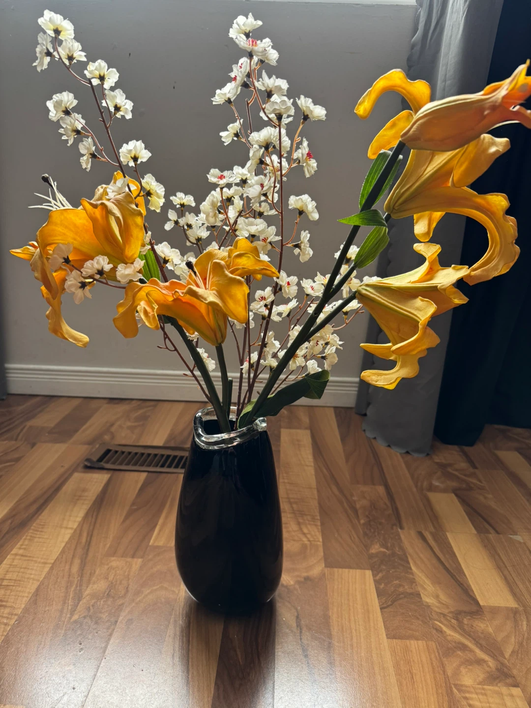 Black Glass Vase with Artificial Flowers