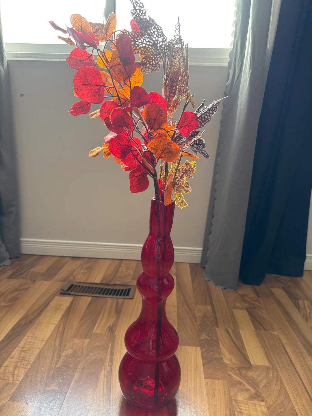Red Glass Vase with Fall Floral Arrangement