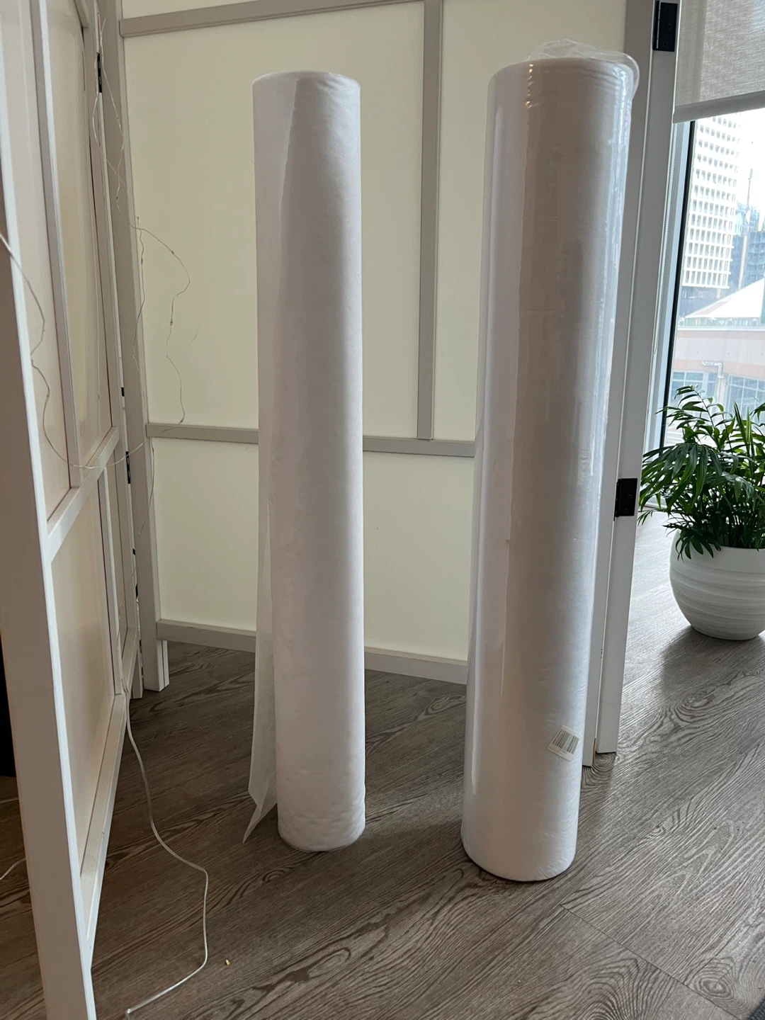 Two Rolls of White Non Woven fabric