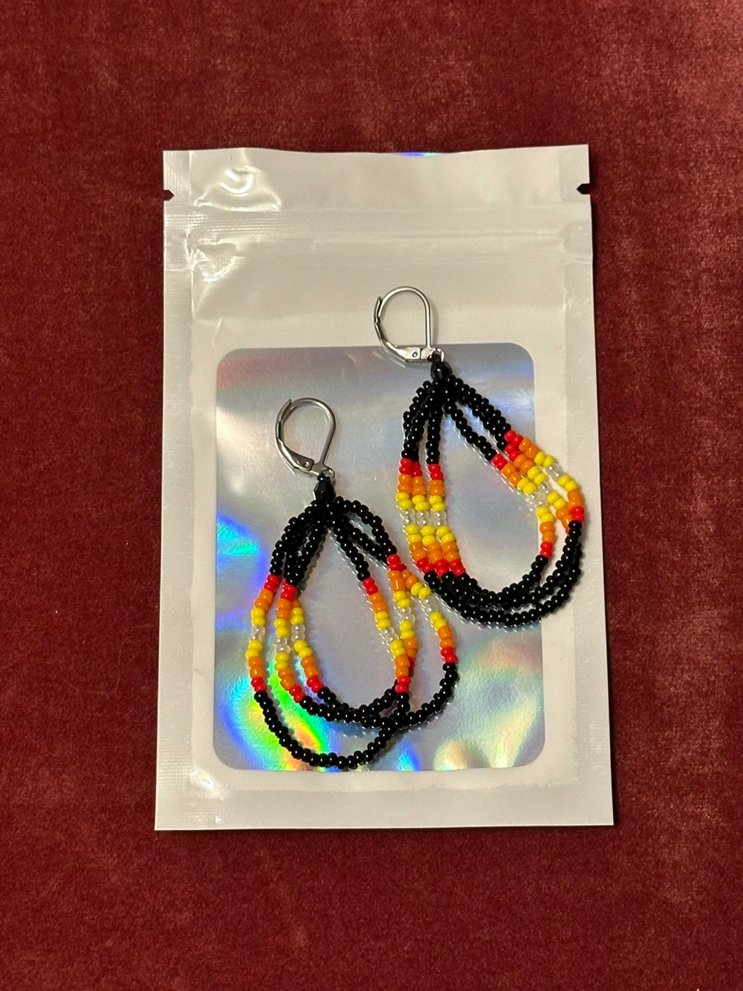 Three dangle loop earrings