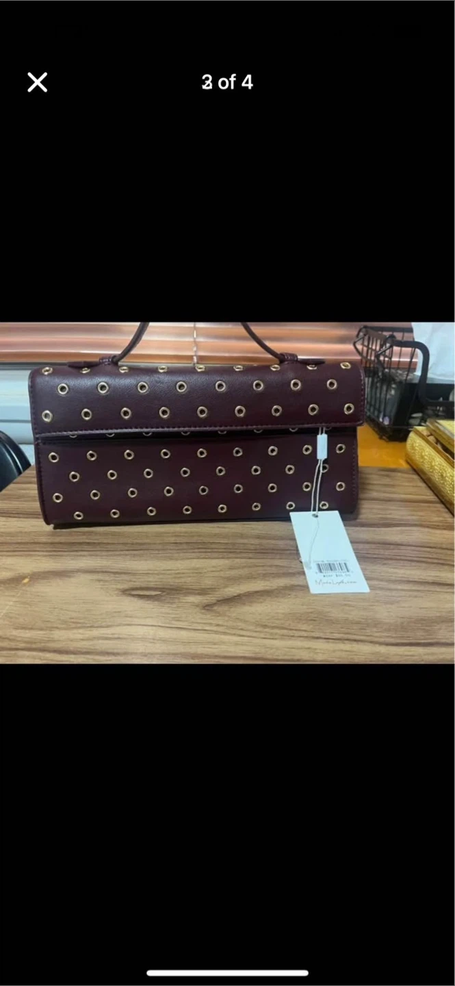 Burgundy Handbag with Gold Eyelet Detailing