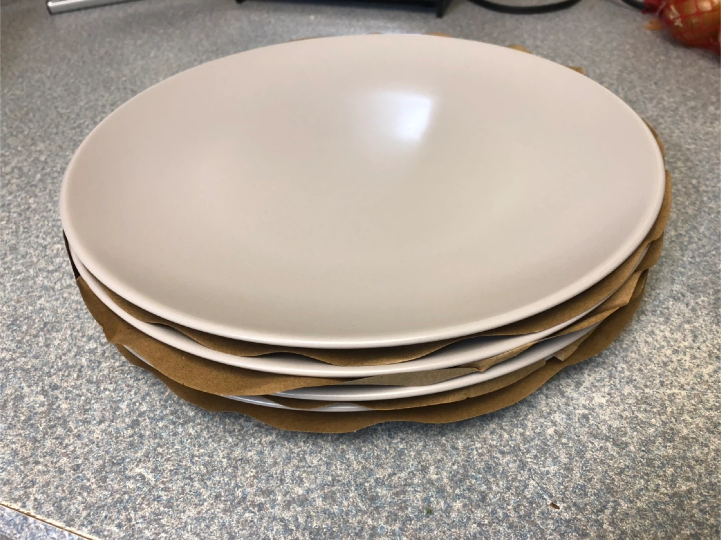 New used 26cm plates  (Set of 4)