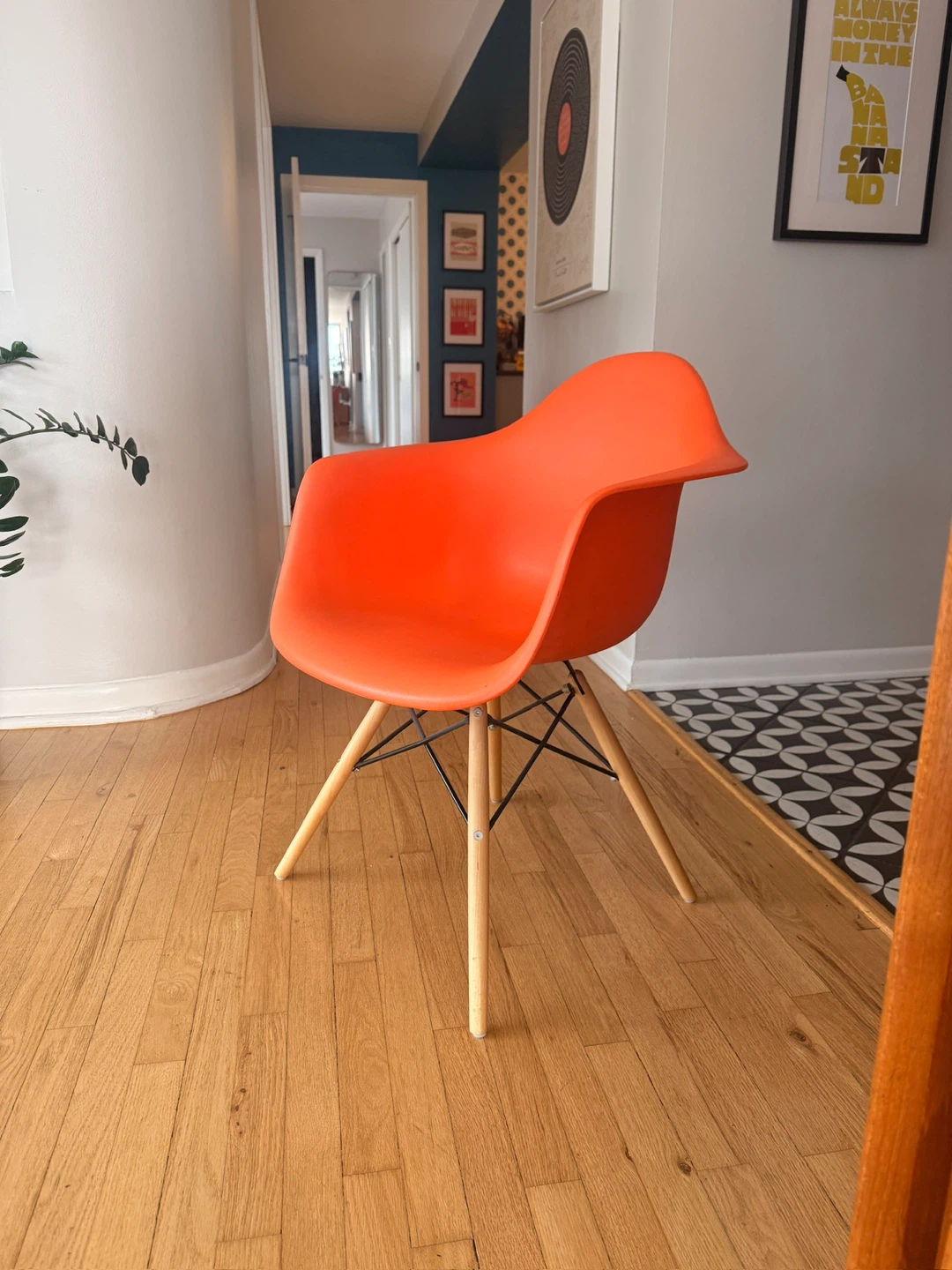 Mid century Orange Molded Plastic Chair with Wood Legs