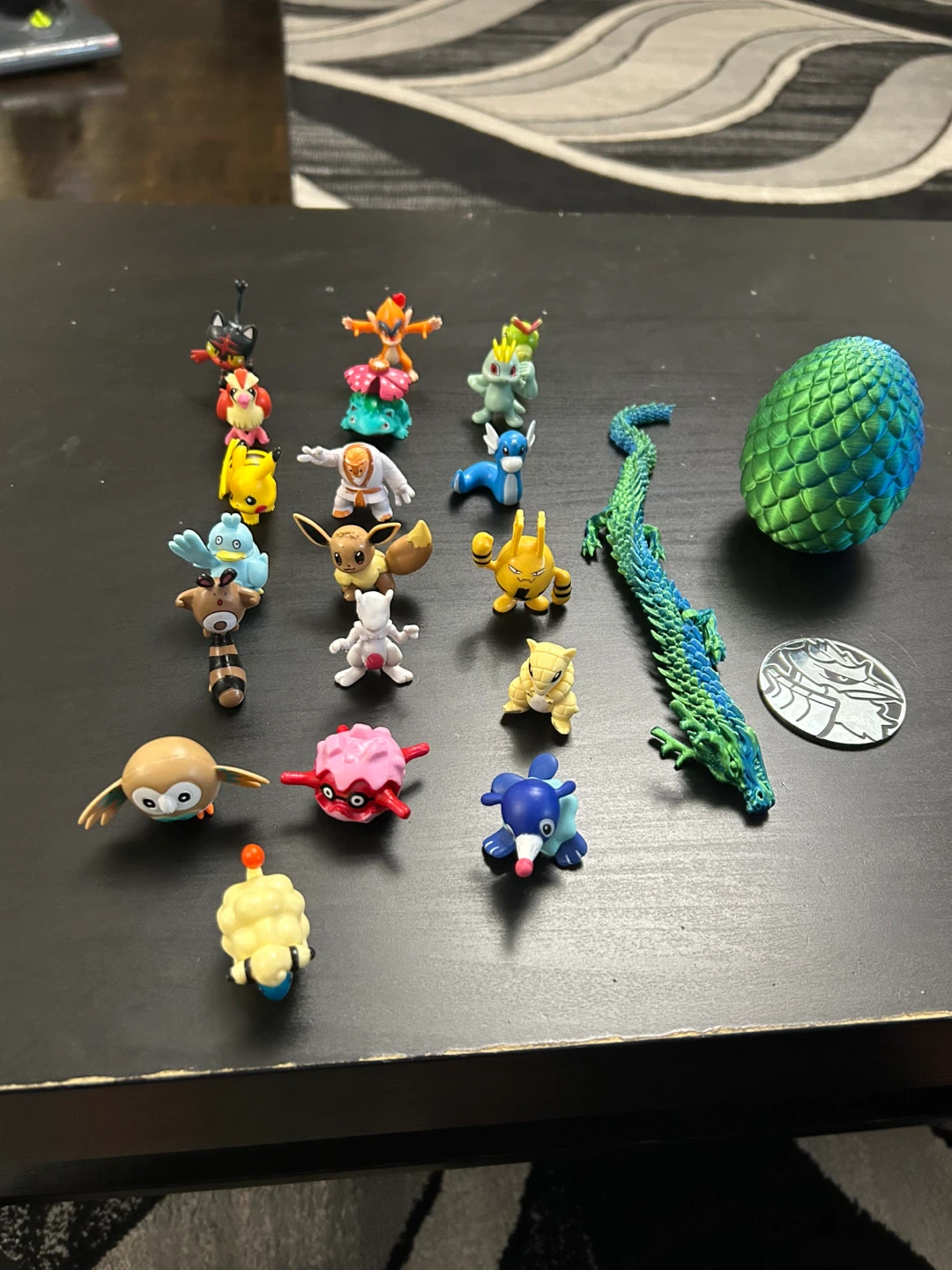 Assorted Pokémon Mini Figures and Dragon Figurine